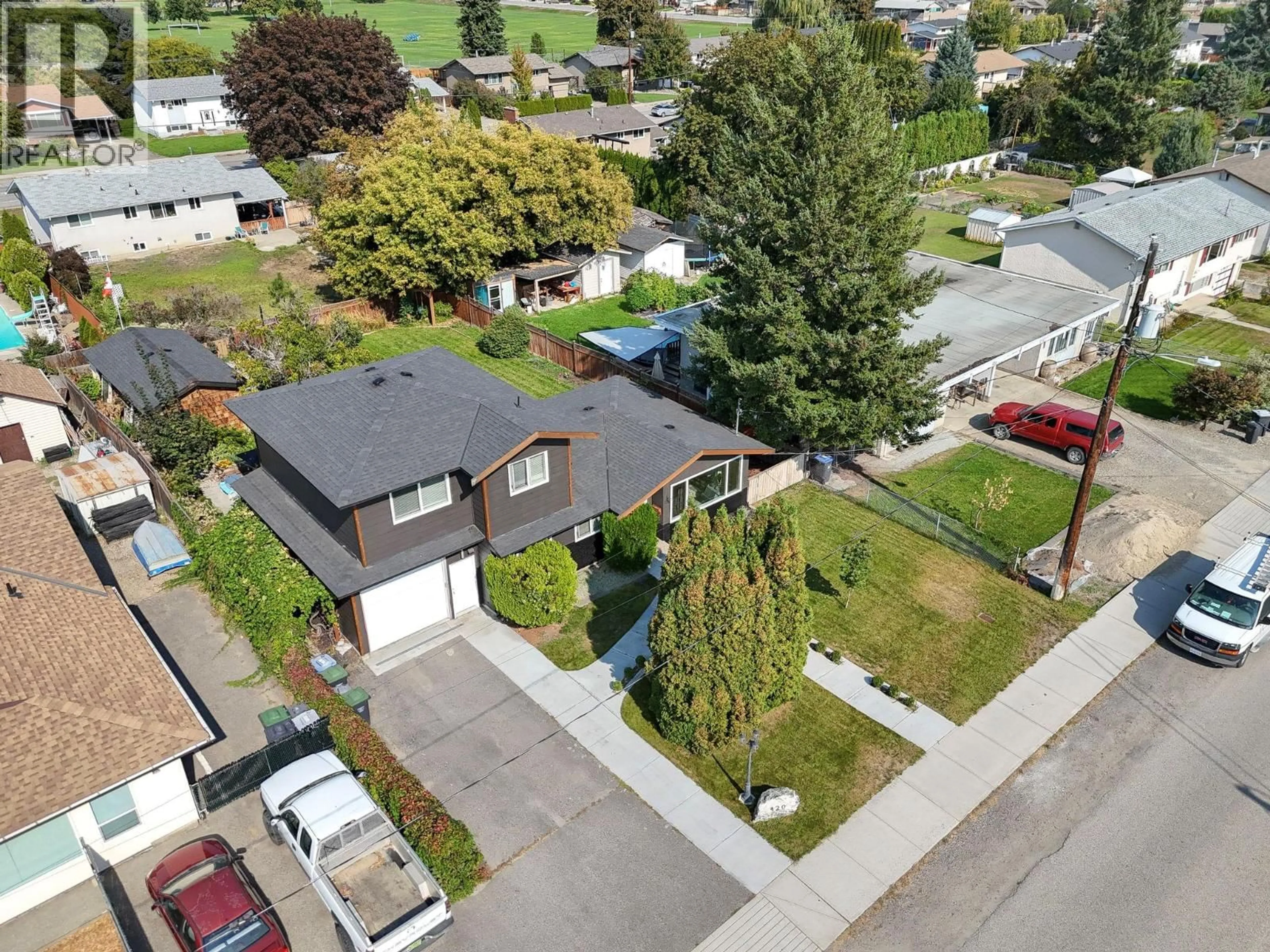 A pic from outside/outdoor area/front of a property/back of a property/a pic from drone, street for 420 HARDIE ROAD, Kelowna British Columbia V1X2H2