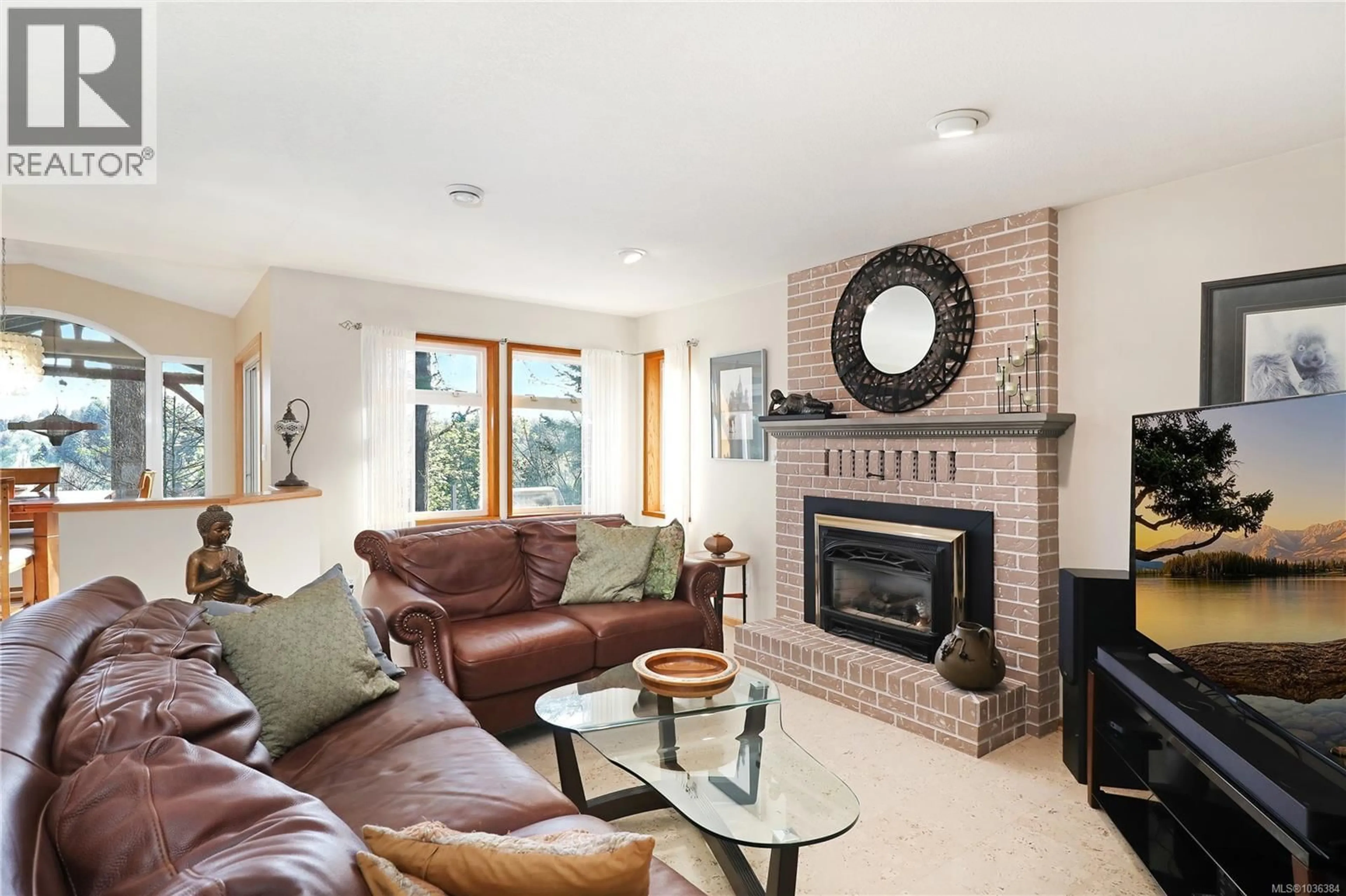 Living room with furniture, ceramic/tile floor for 2371 STEELHEAD ROAD, Campbell River British Columbia V9W4P4
