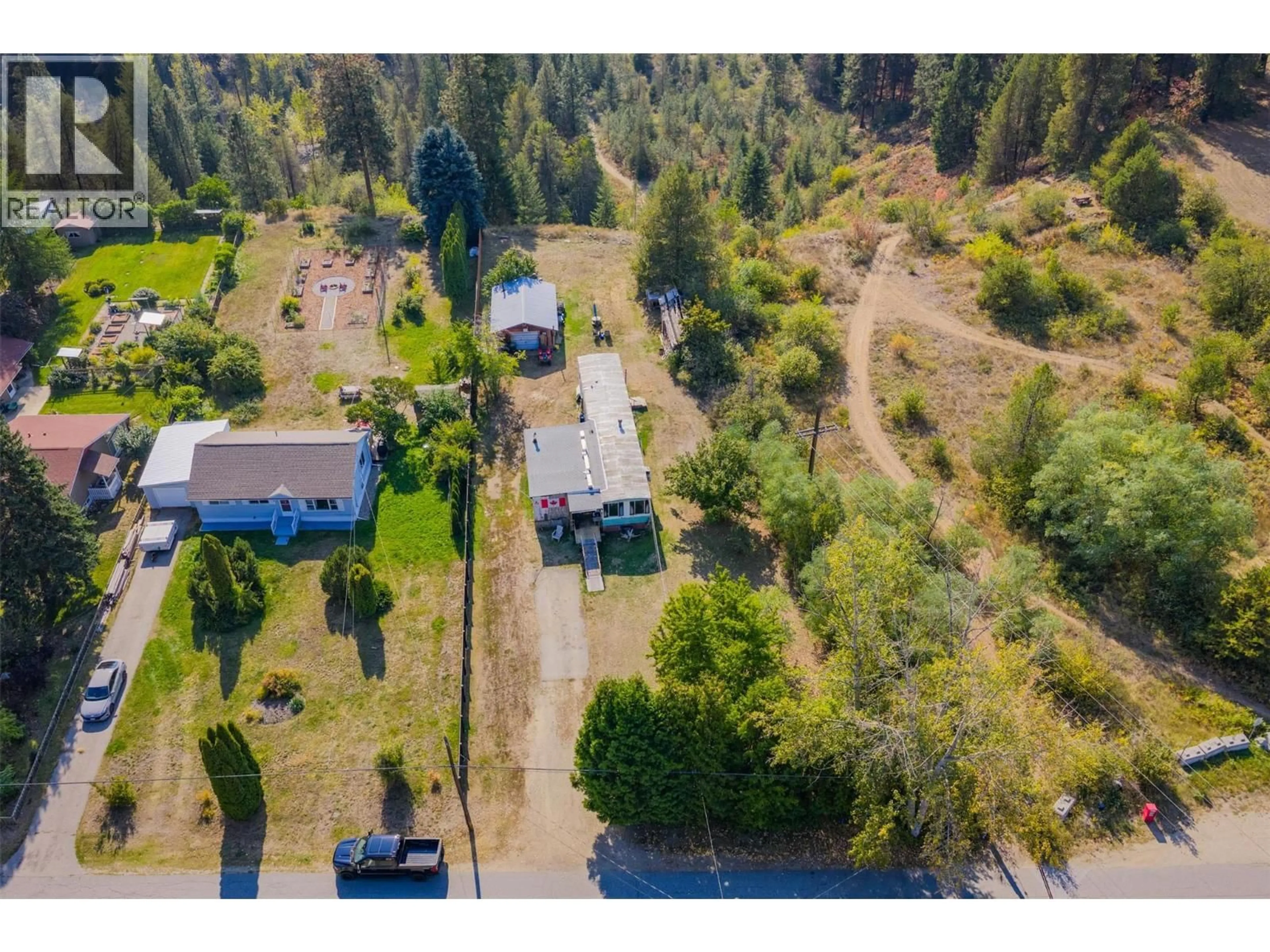 A pic from outside/outdoor area/front of a property/back of a property/a pic from drone, unknown for 126 100TH STREET, Castlegar British Columbia V1N3C5