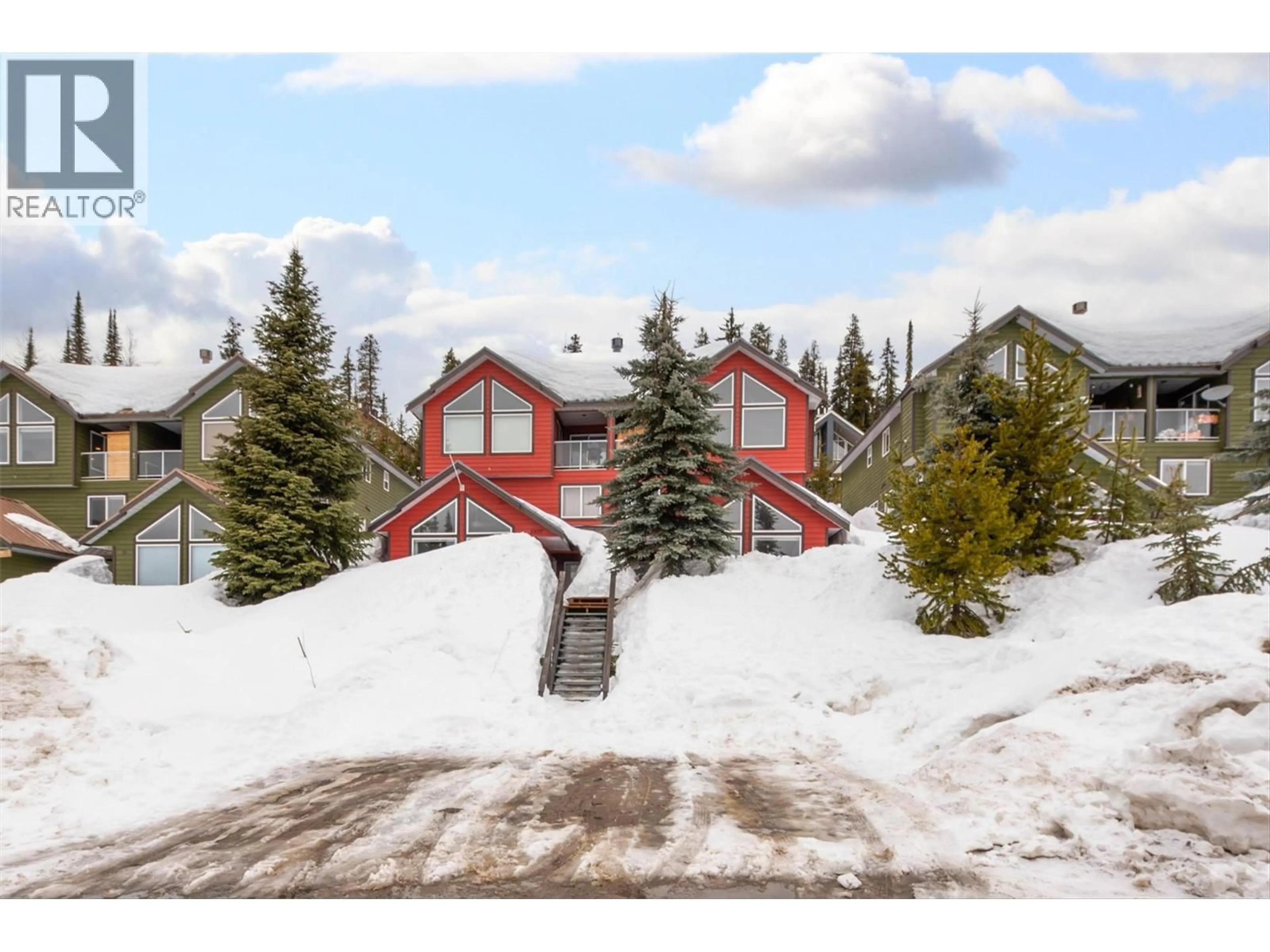 A pic from outside/outdoor area/front of a property/back of a property/a pic from drone, mountain view for 116D - 5977 SNOW PINES CRESCENT, Big White British Columbia V1P1P3