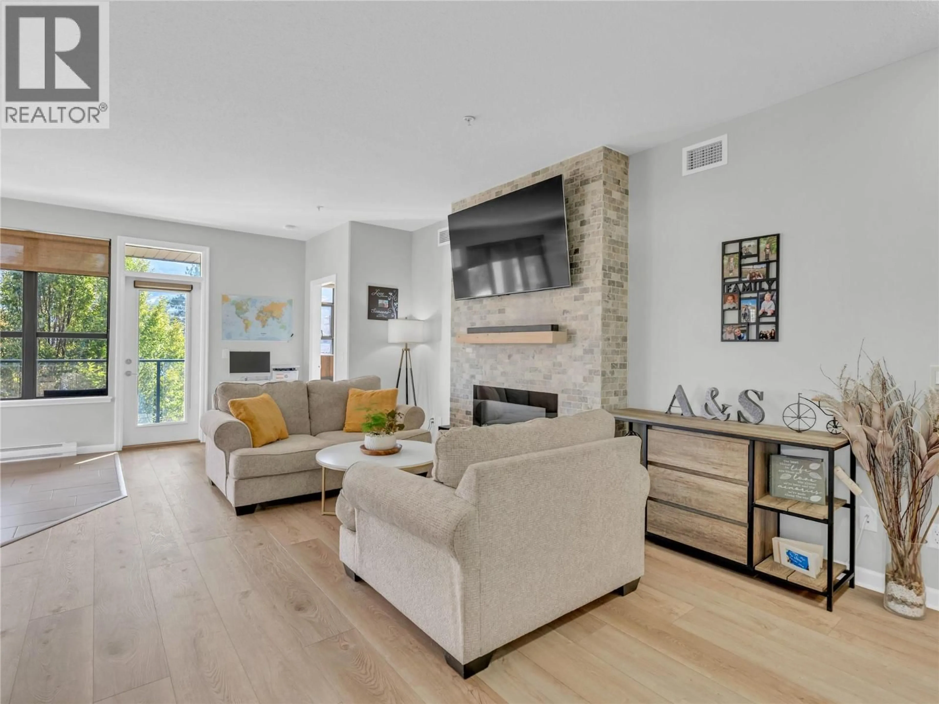 Living room with furniture, unknown for 303 - 3589 SKAHA LAKE ROAD, Penticton British Columbia V2A7K2