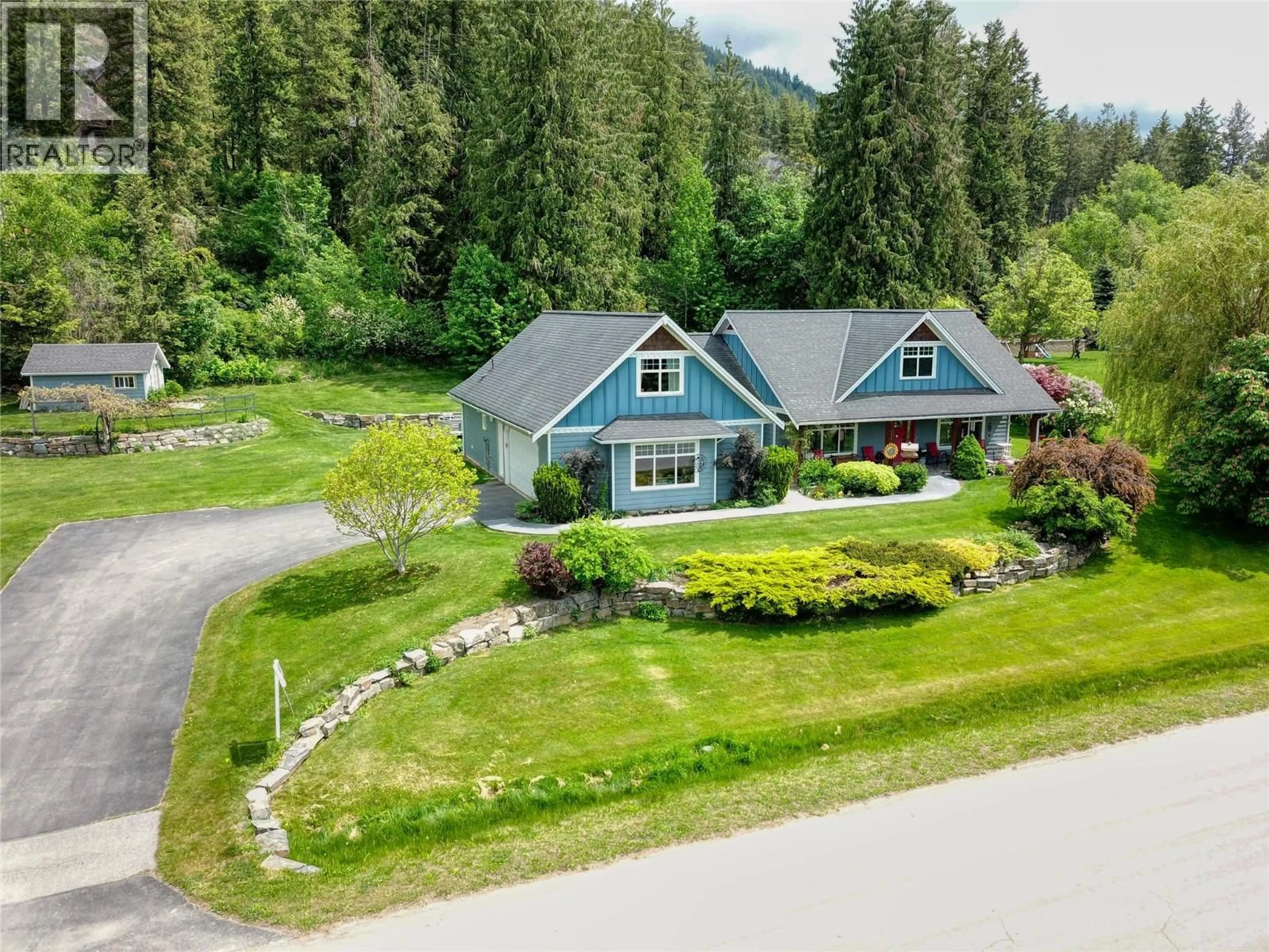 A pic from outside/outdoor area/front of a property/back of a property/a pic from drone, mountain view for 1324 8TH AVENUE NORTH, Creston British Columbia V0B1G6