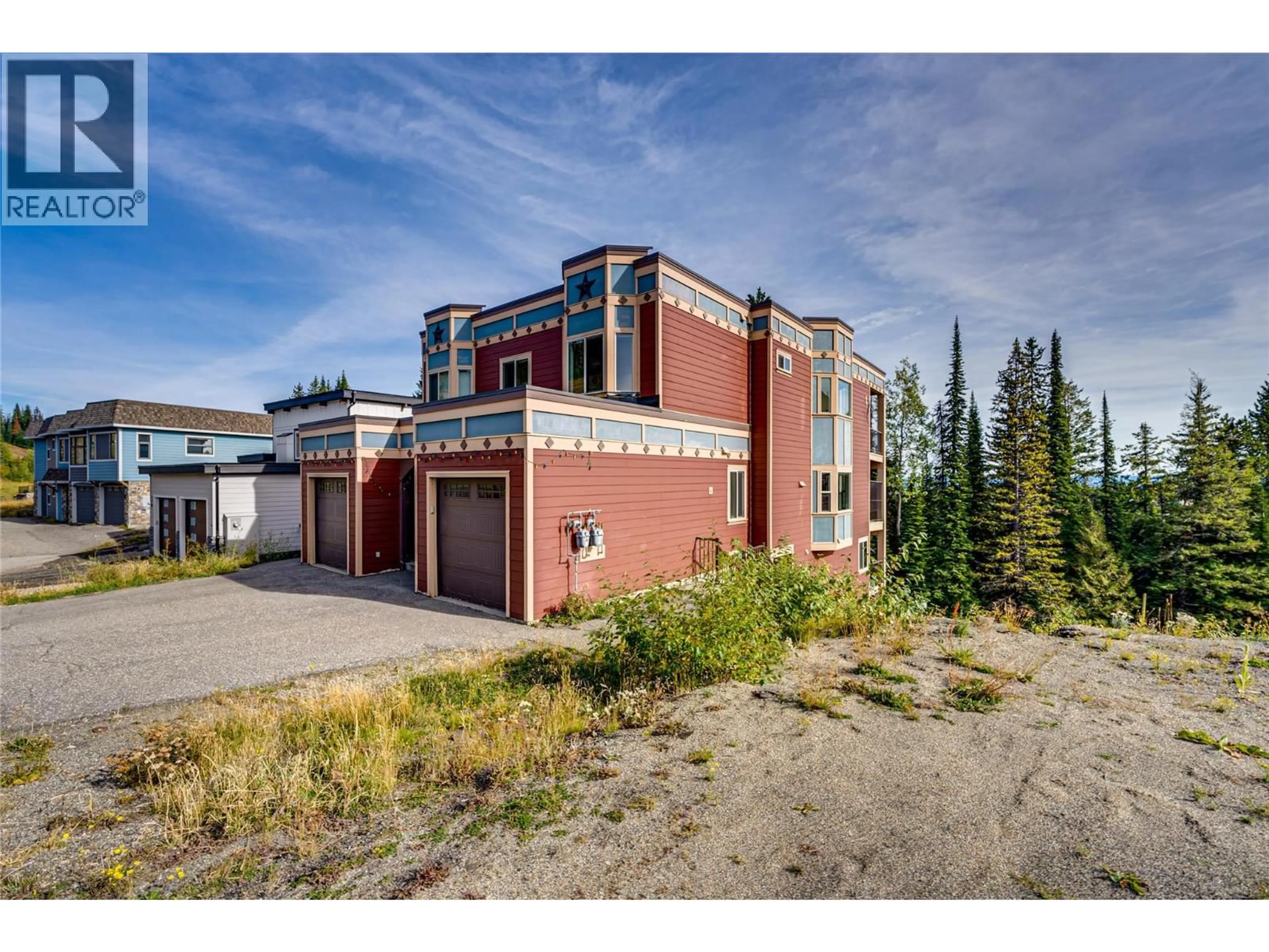 A pic from outside/outdoor area/front of a property/back of a property/a pic from drone, building for 130 ARNICA LANE, Silver Star British Columbia V1B0S2