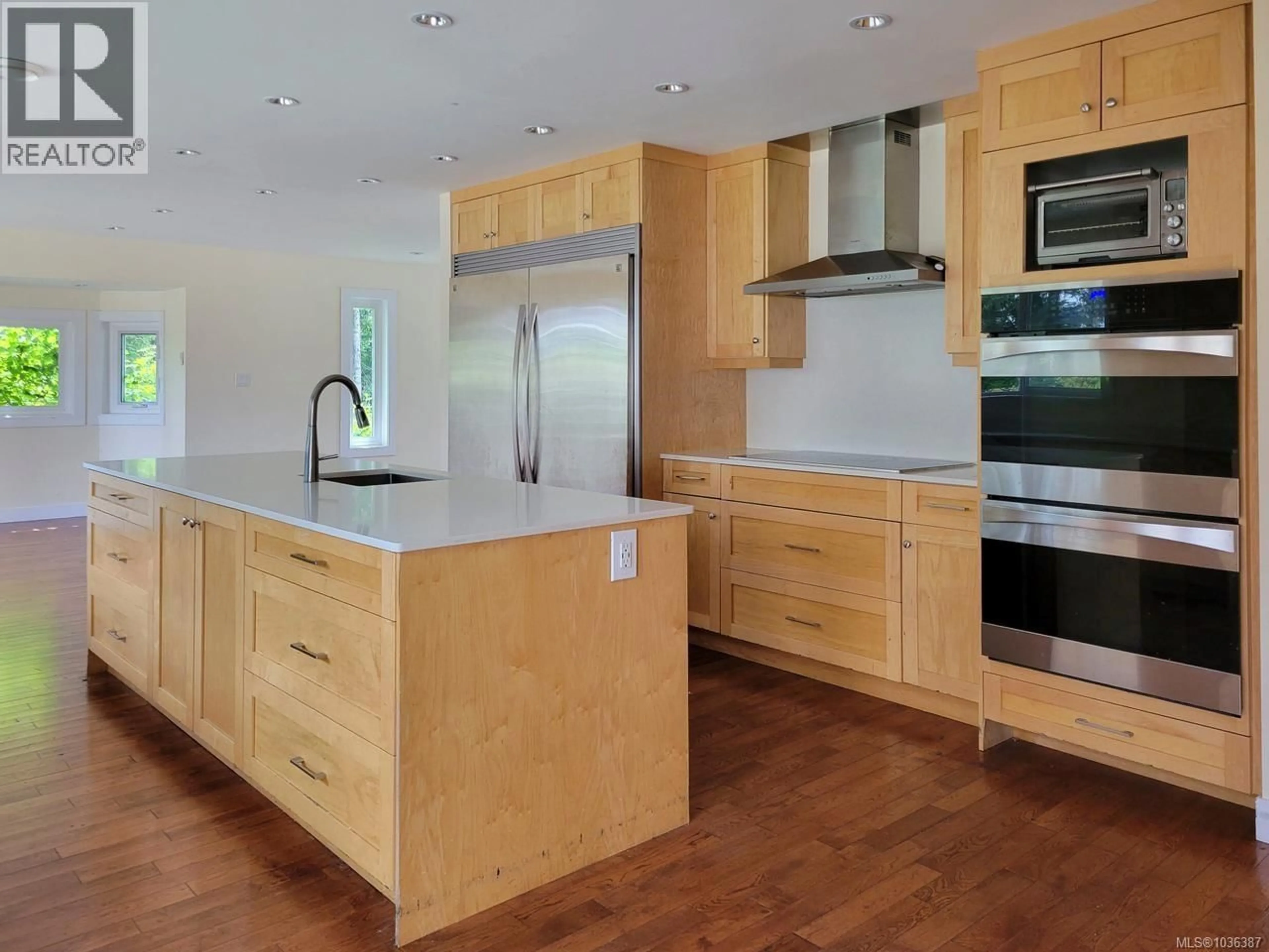 Contemporary kitchen, wood/laminate floor for 4611 MCGILL ROAD, Cowichan Bay British Columbia V0R1N1