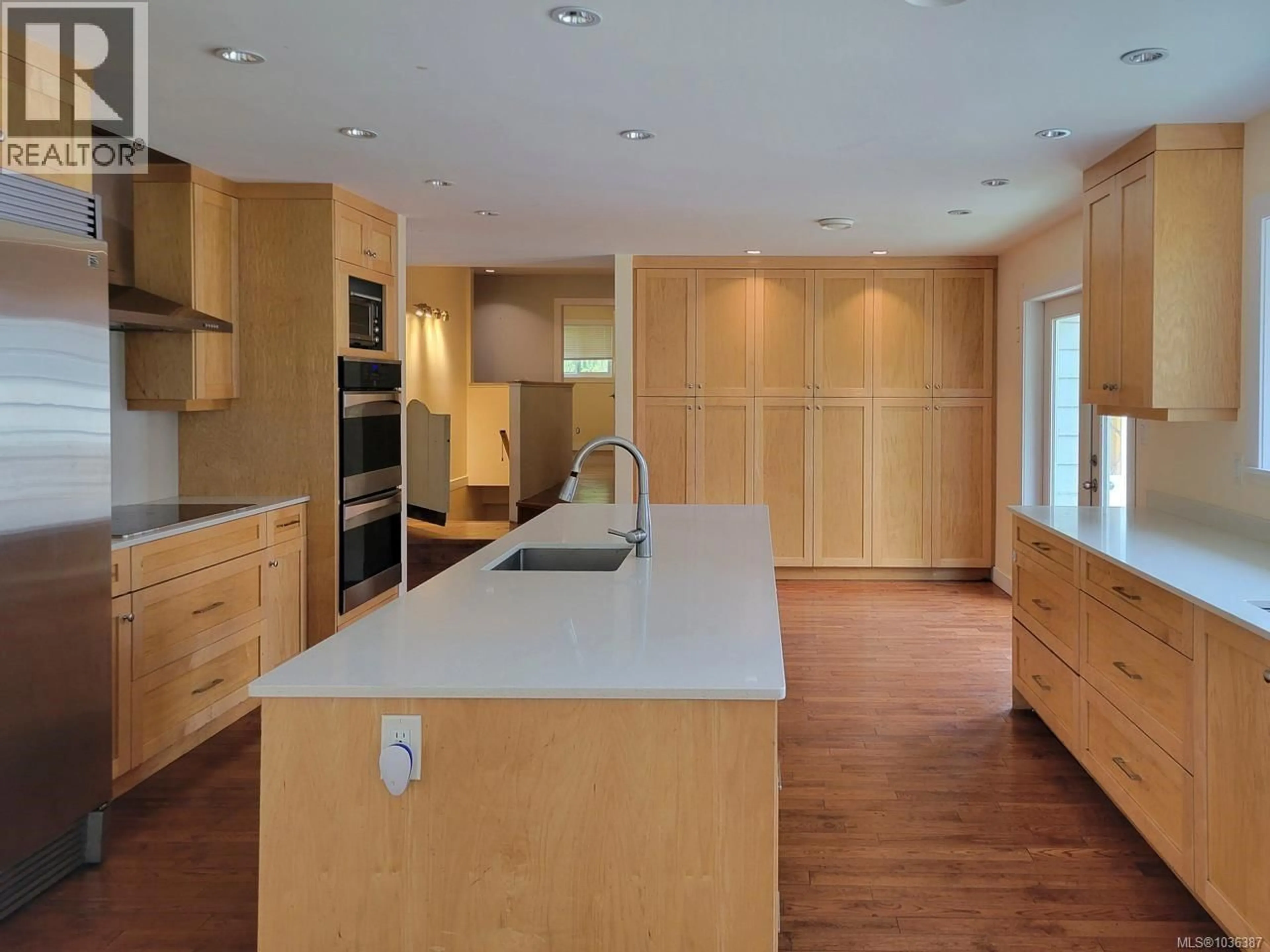 Open concept kitchen, wood/laminate floor for 4611 MCGILL ROAD, Cowichan Bay British Columbia V0R1N1