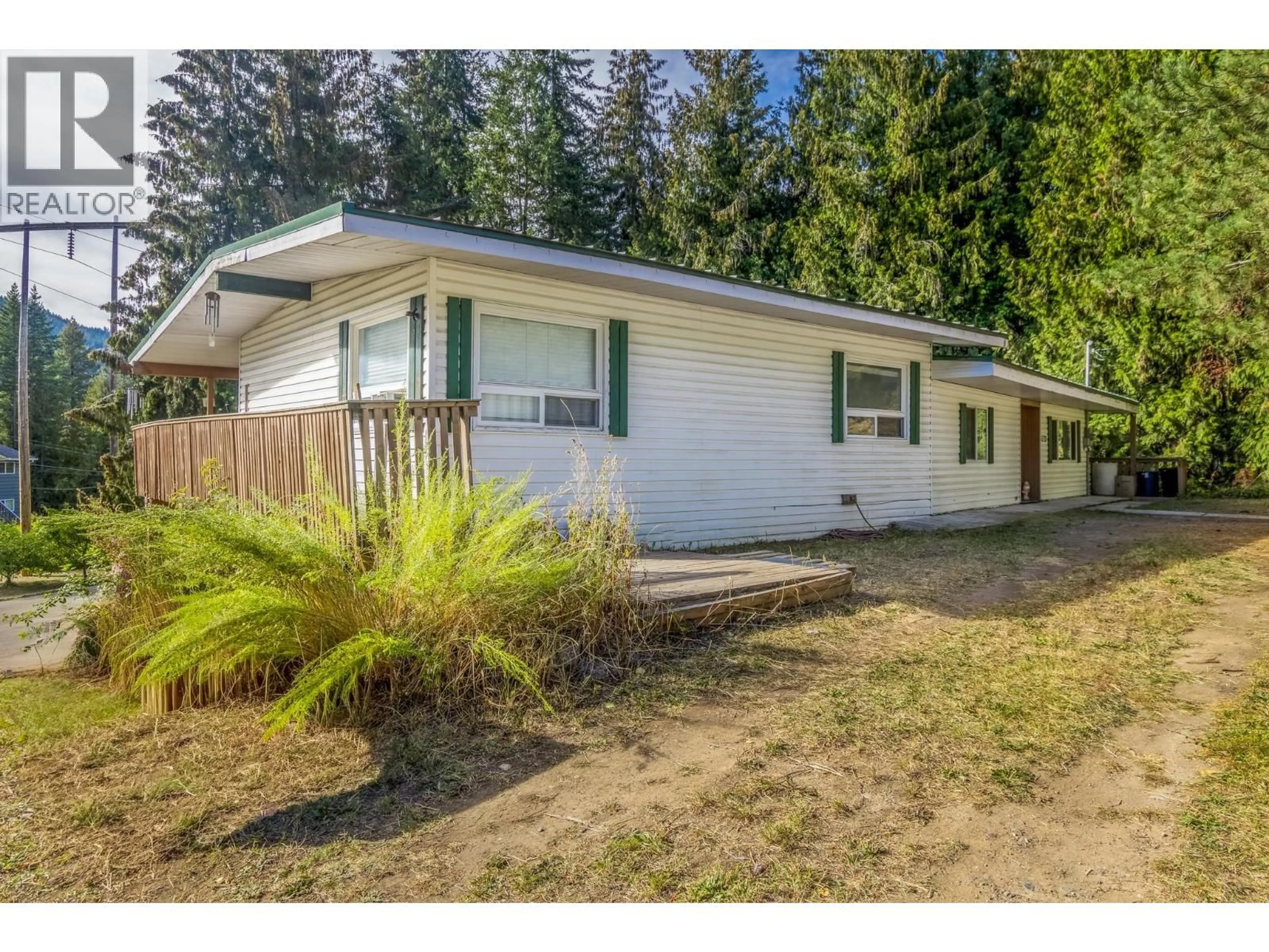 Home with vinyl exterior material, street for 5246 MAYFAIR ROAD SOUTHEAST, Salmon Arm British Columbia V1E2P8