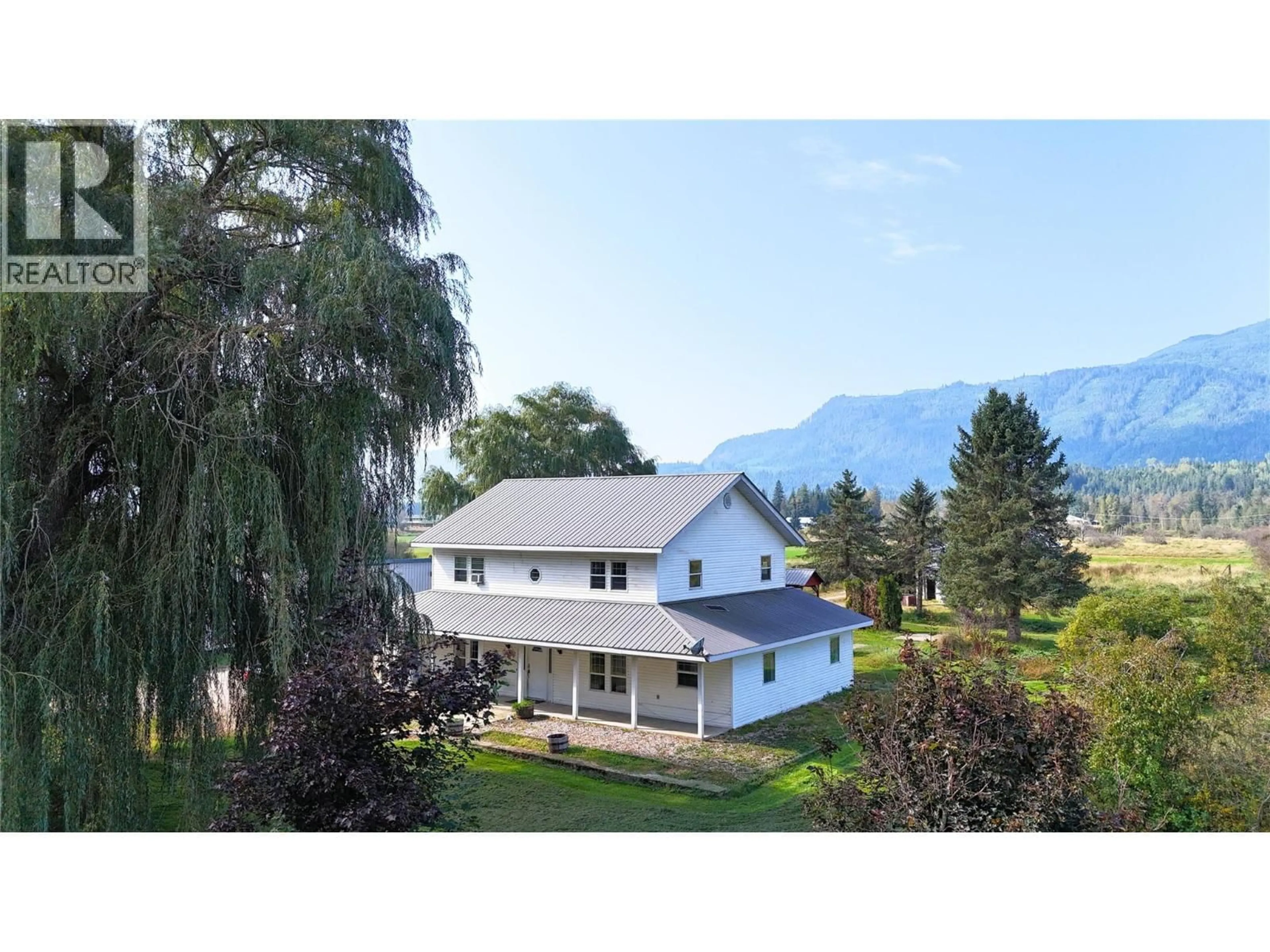 A pic from outside/outdoor area/front of a property/back of a property/a pic from drone, mountain view for 3695 MALAKWA LOOP ROAD, Malakwa British Columbia V0E2J0