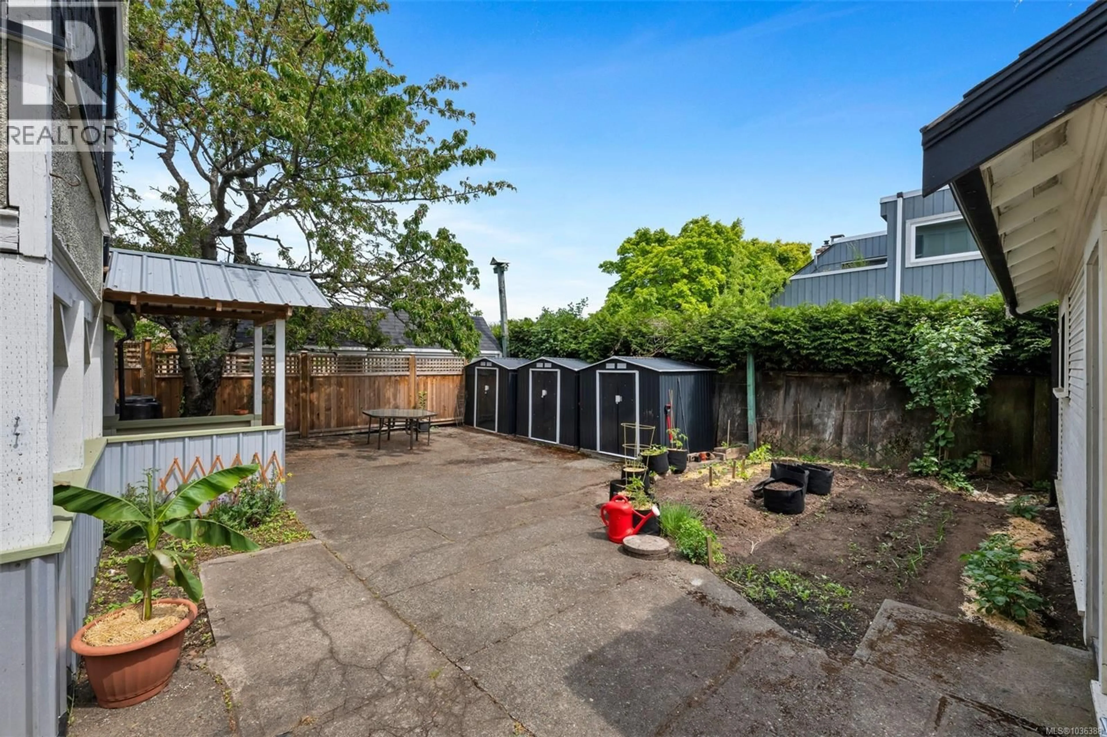 A pic from outside/outdoor area/front of a property/back of a property/a pic from drone, street for 1909 FERNWOOD ROAD, Victoria British Columbia V8T2Y6
