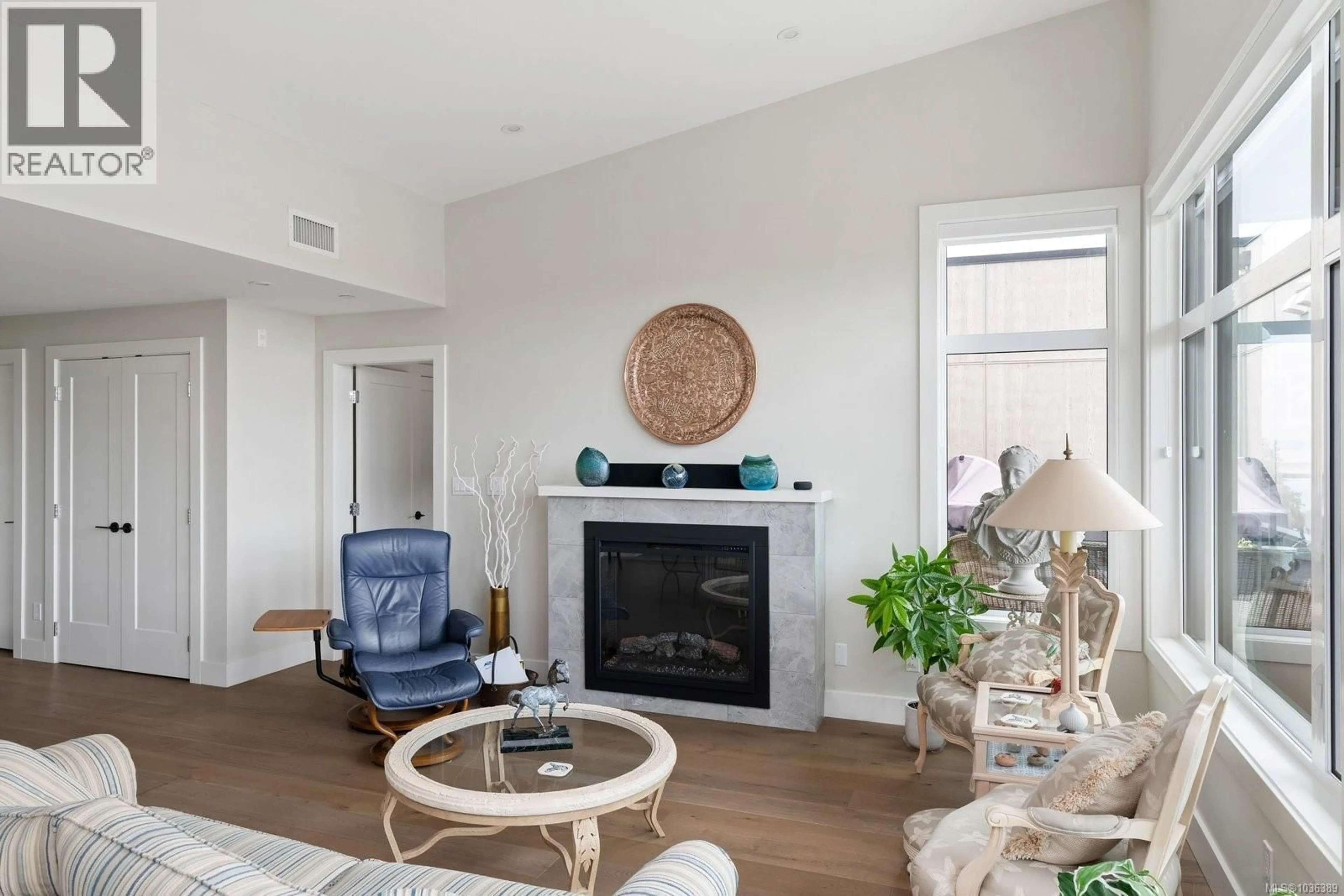 Living room with furniture, unknown for 603 - 2520 HACKETT CRESCENT, Central Saanich British Columbia V8M0B9