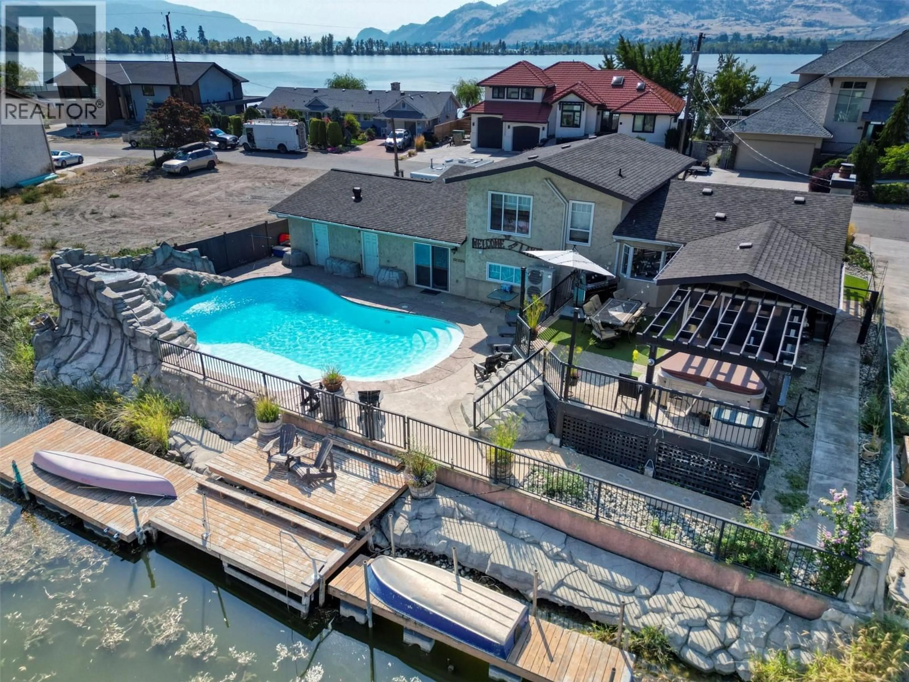 A pic from outside/outdoor area/front of a property/back of a property/a pic from drone, water/lake/river/ocean view for 52 HARBOUR KEY DRIVE, Osoyoos British Columbia V0H1V3