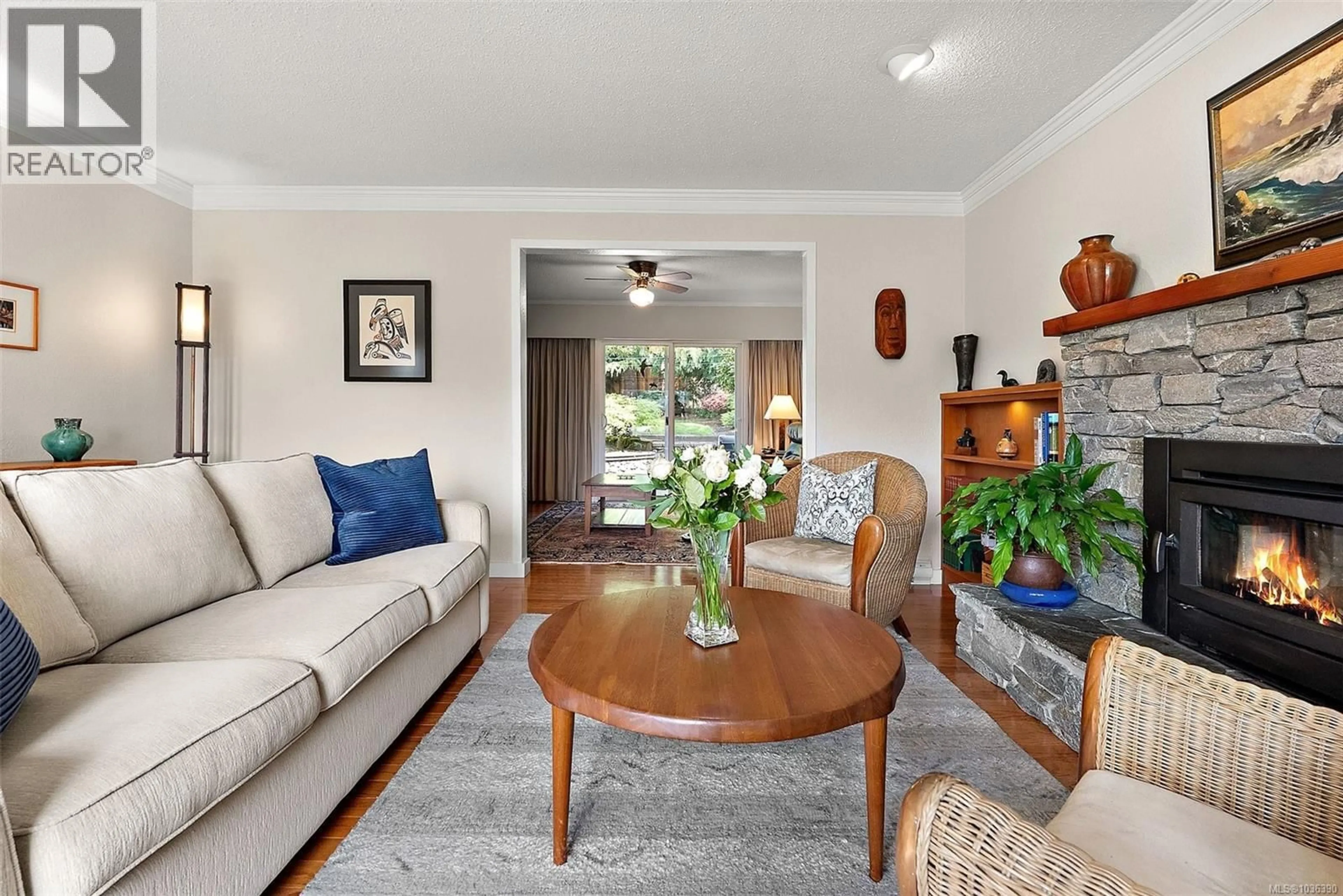 Living room with furniture, unknown for 7211 KIMPATA WAY, Central Saanich British Columbia V8M1C1