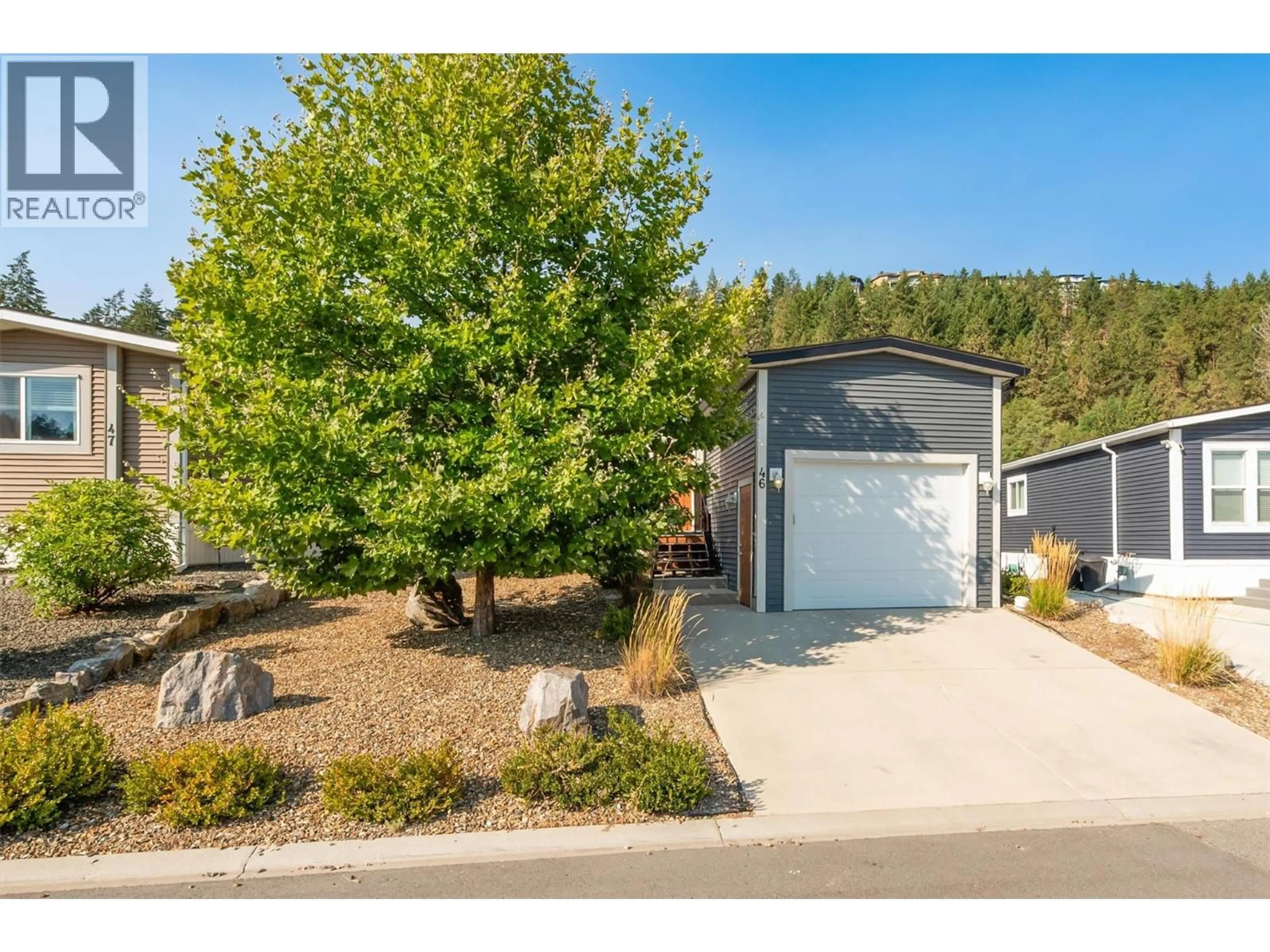 A pic from outside/outdoor area/front of a property/back of a property/a pic from drone, street for 46 - 1835 NANCEE WAY COURT, Kelowna British Columbia V1Z4C1