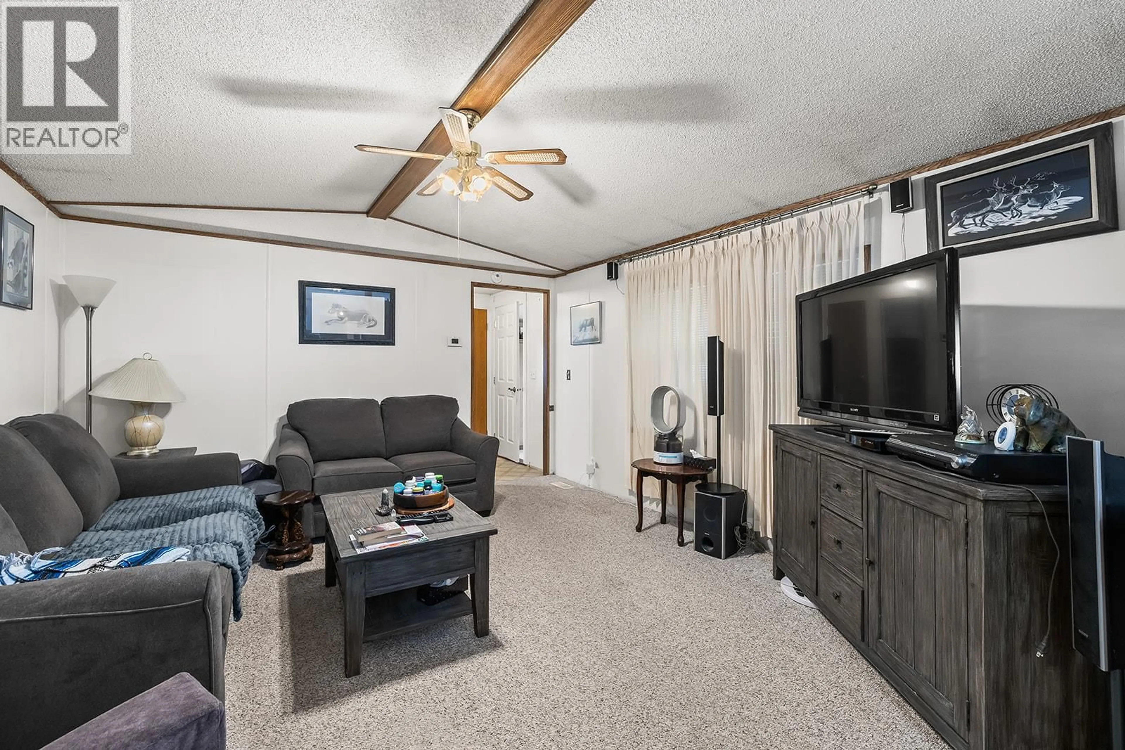 Living room with furniture, unknown for 3381 VILLAGE GREEN WAY, West Kelowna British Columbia V4T1L2