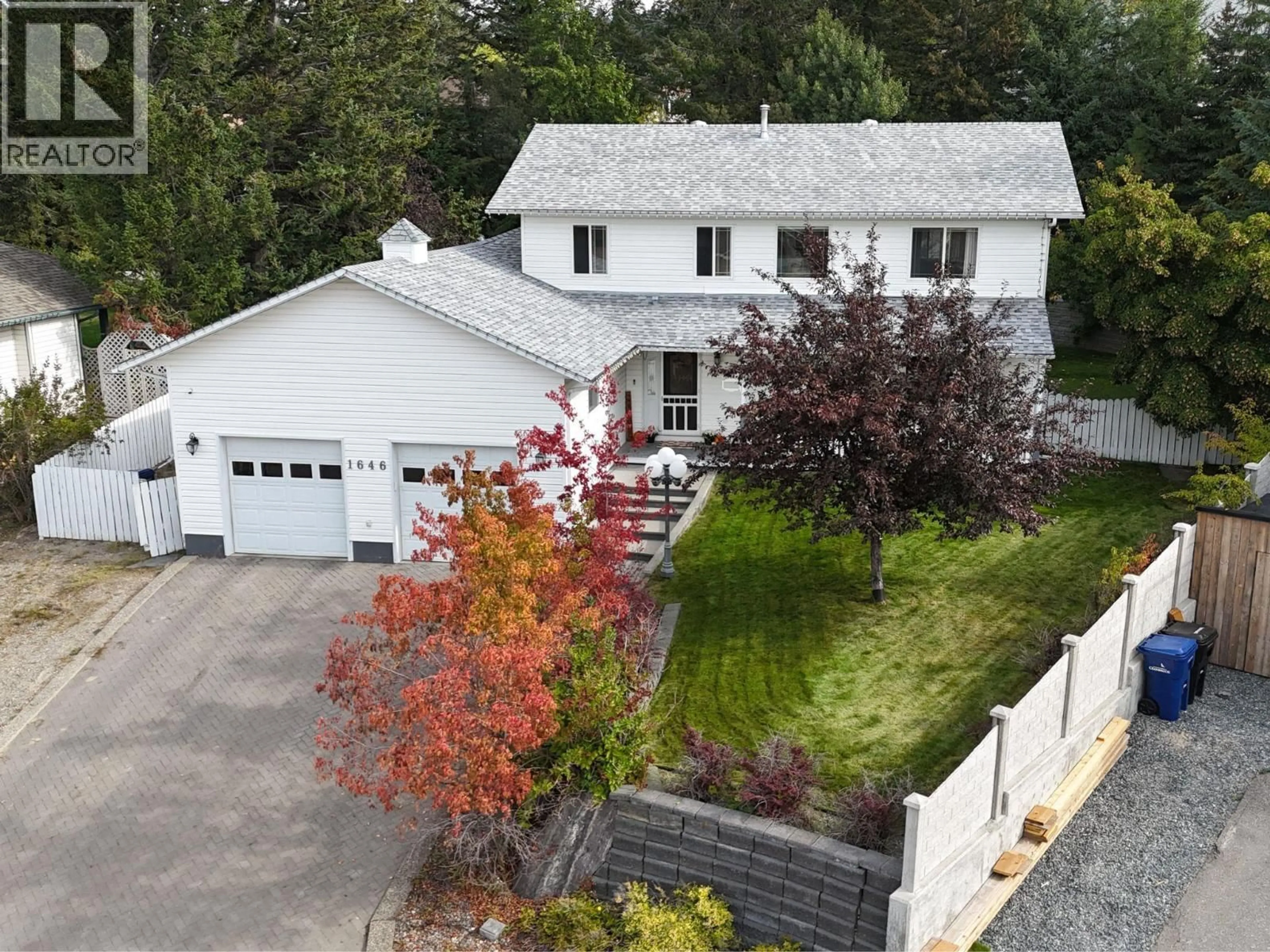 A pic from outside/outdoor area/front of a property/back of a property/a pic from drone, street for 1646 MT PYRAMID CRESCENT, Cranbrook British Columbia V1C6N6