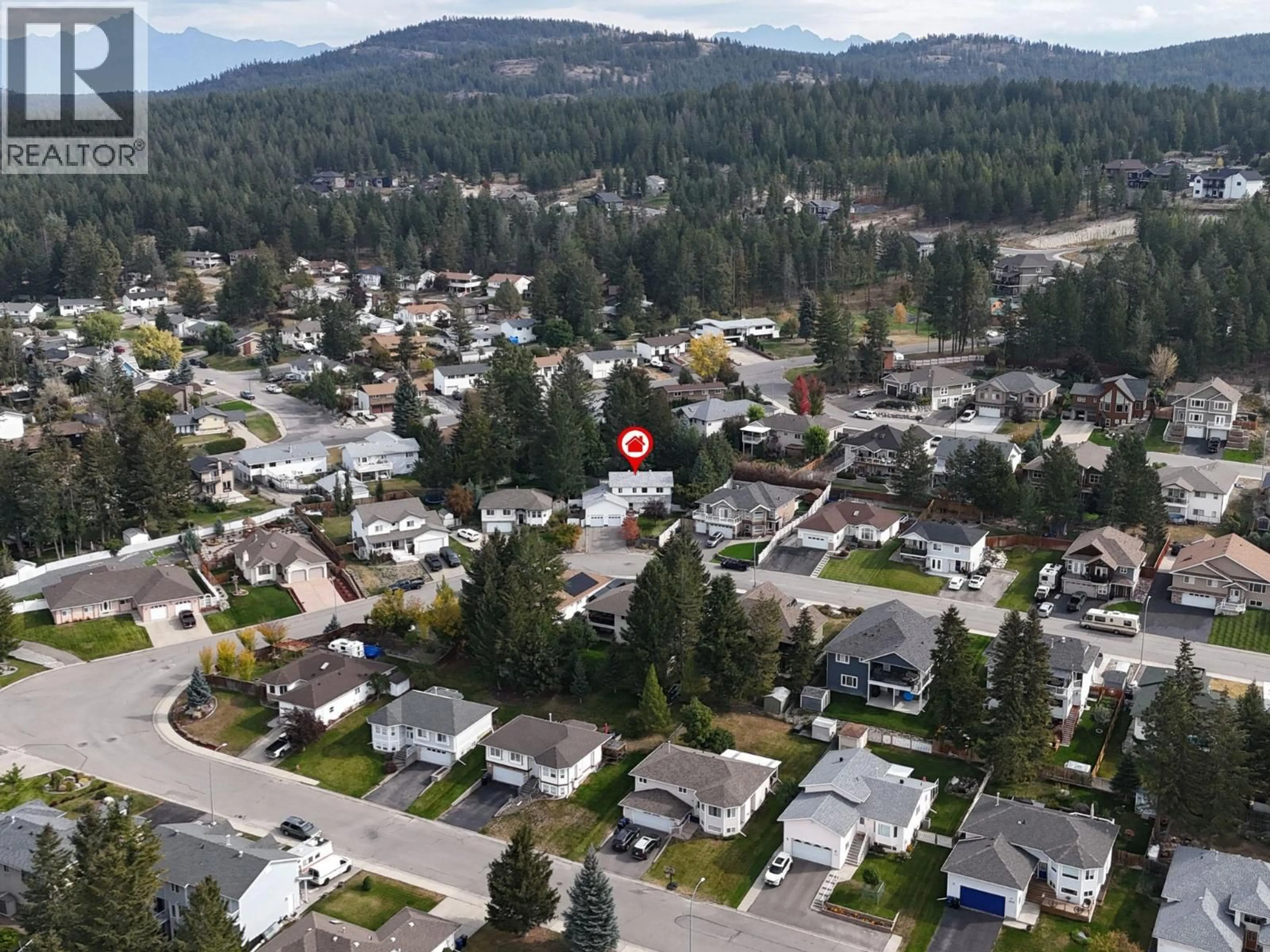 A pic from outside/outdoor area/front of a property/back of a property/a pic from drone, mountain view for 1646 MT PYRAMID CRESCENT, Cranbrook British Columbia V1C6N6