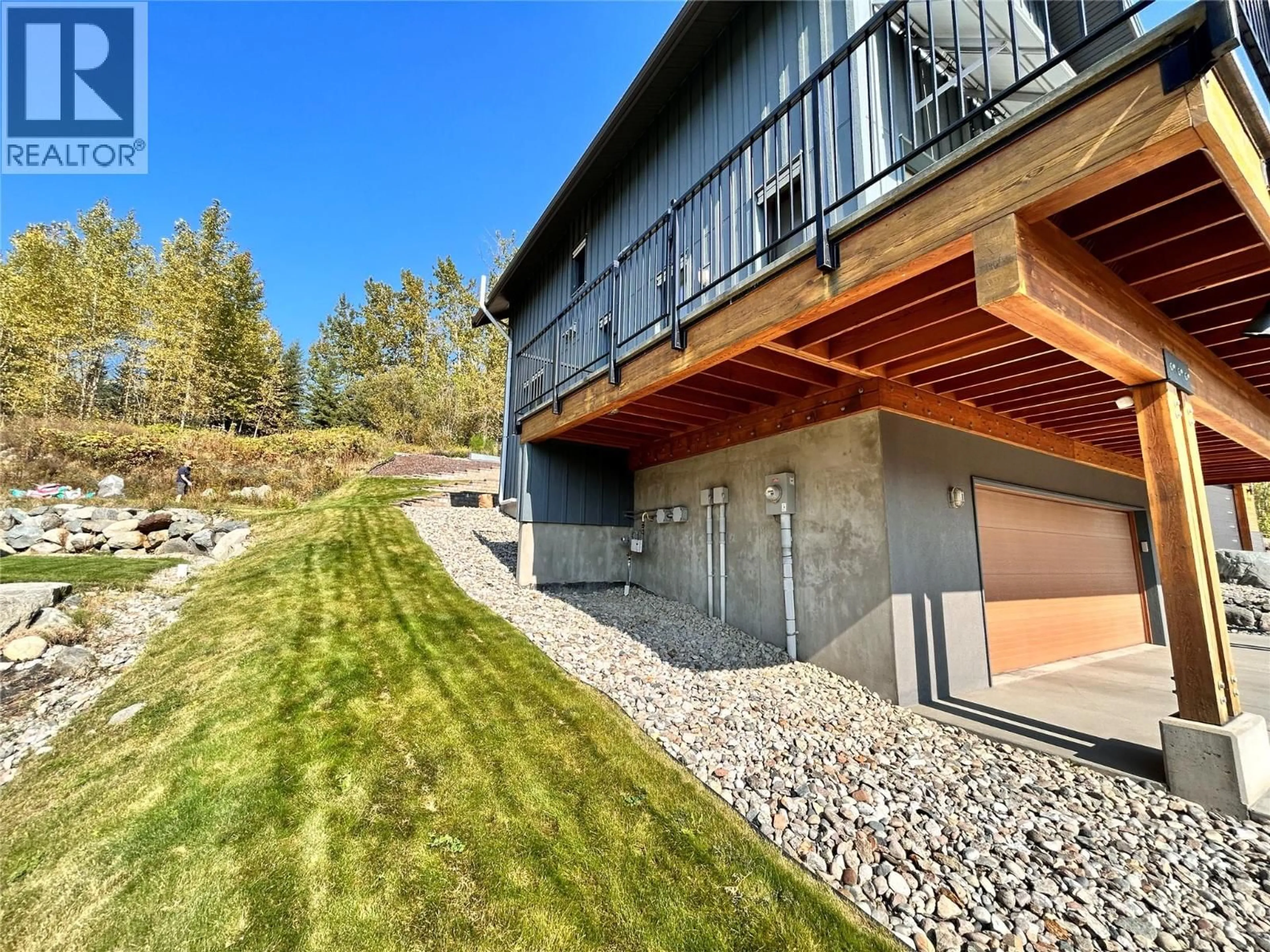 A pic from outside/outdoor area/front of a property/back of a property/a pic from drone, water/lake/river/ocean view for 1006 SILVERTIP ROAD, Rossland British Columbia V0G1Y0