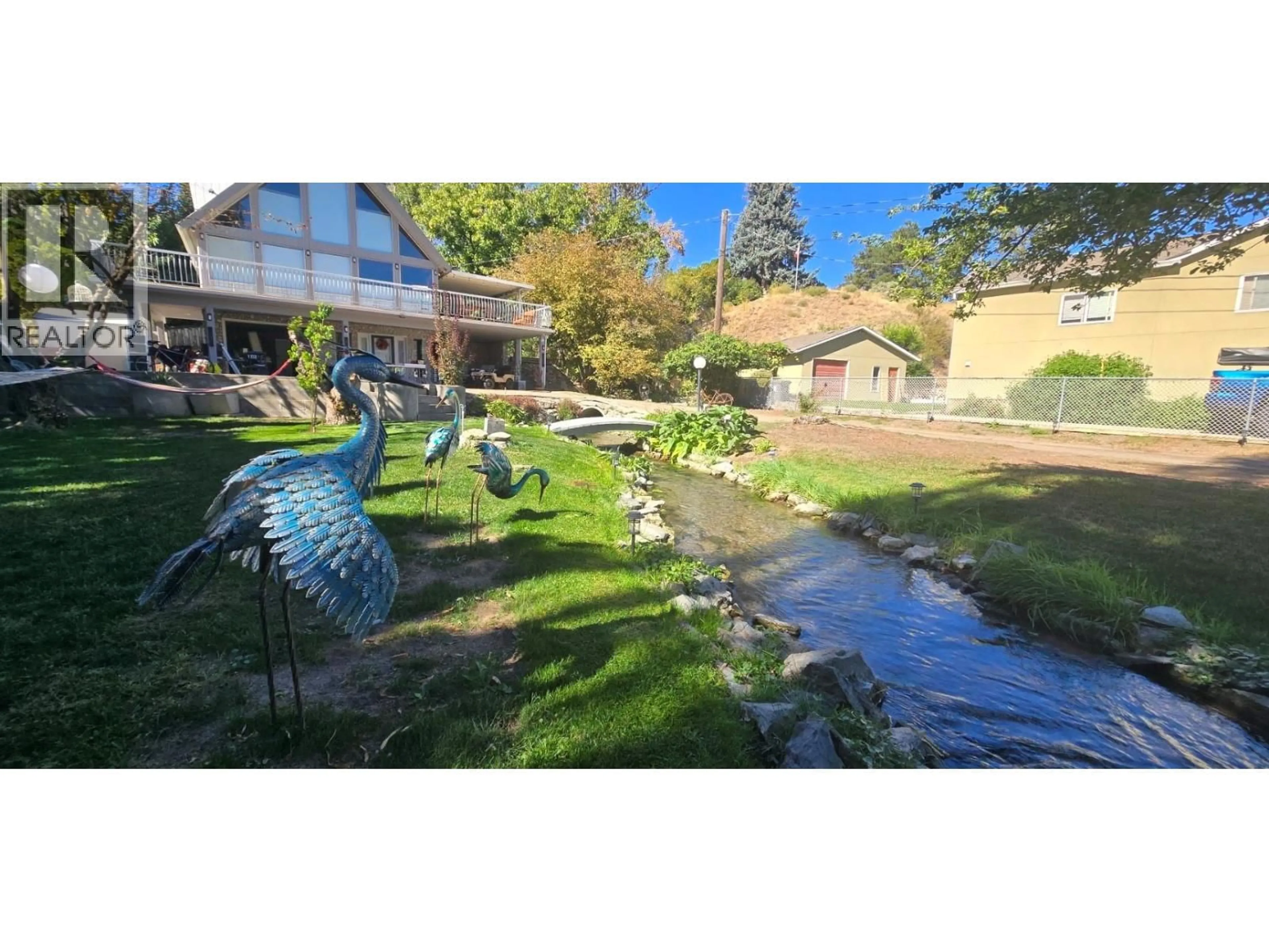 A pic from outside/outdoor area/front of a property/back of a property/a pic from drone, water/lake/river/ocean view for 1602 85TH STREET, Osoyoos British Columbia V0H1V1