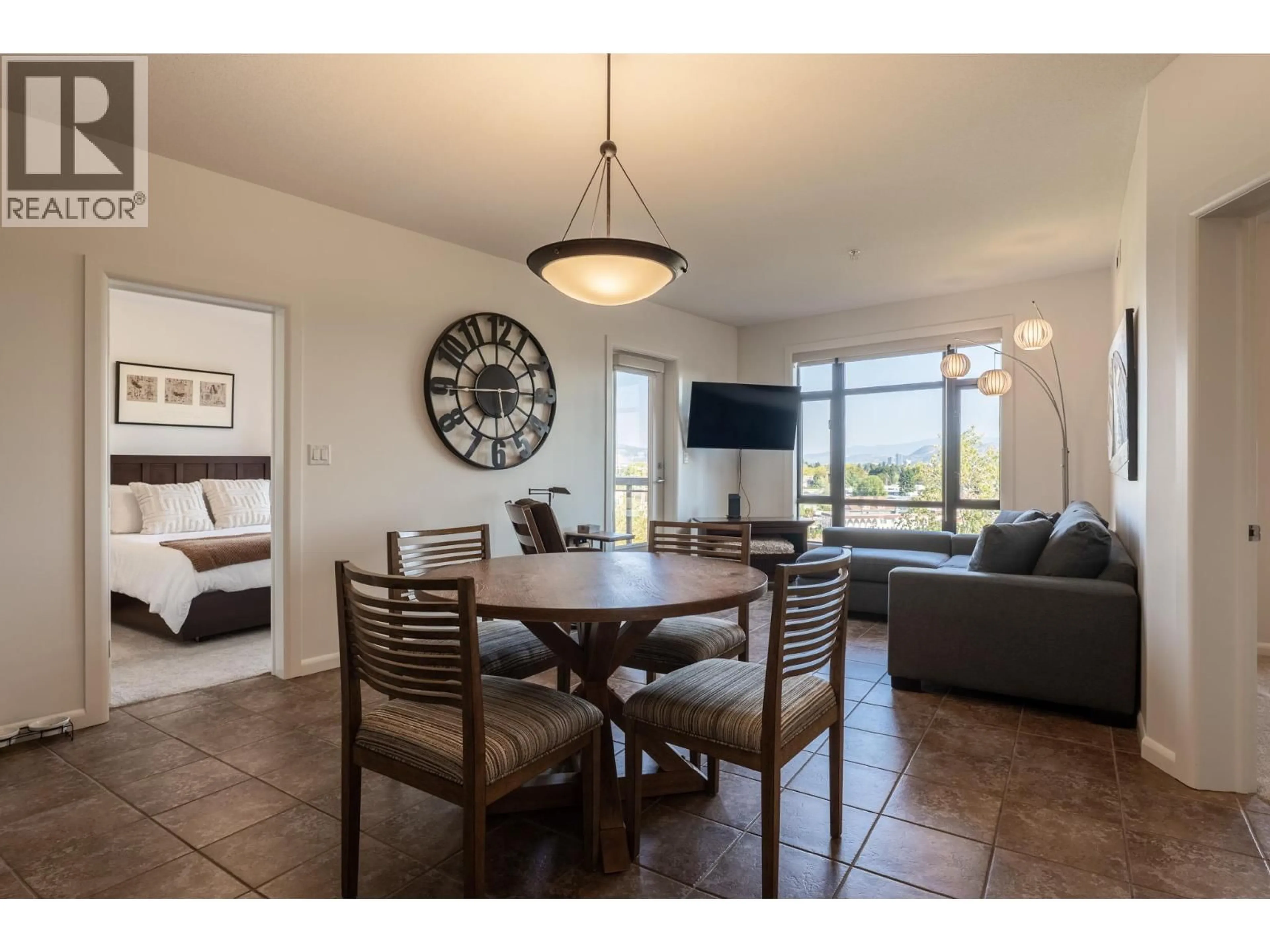Living room with furniture, ceramic/tile floor for 618 - 654 COOK ROAD, Kelowna British Columbia V1W3G7