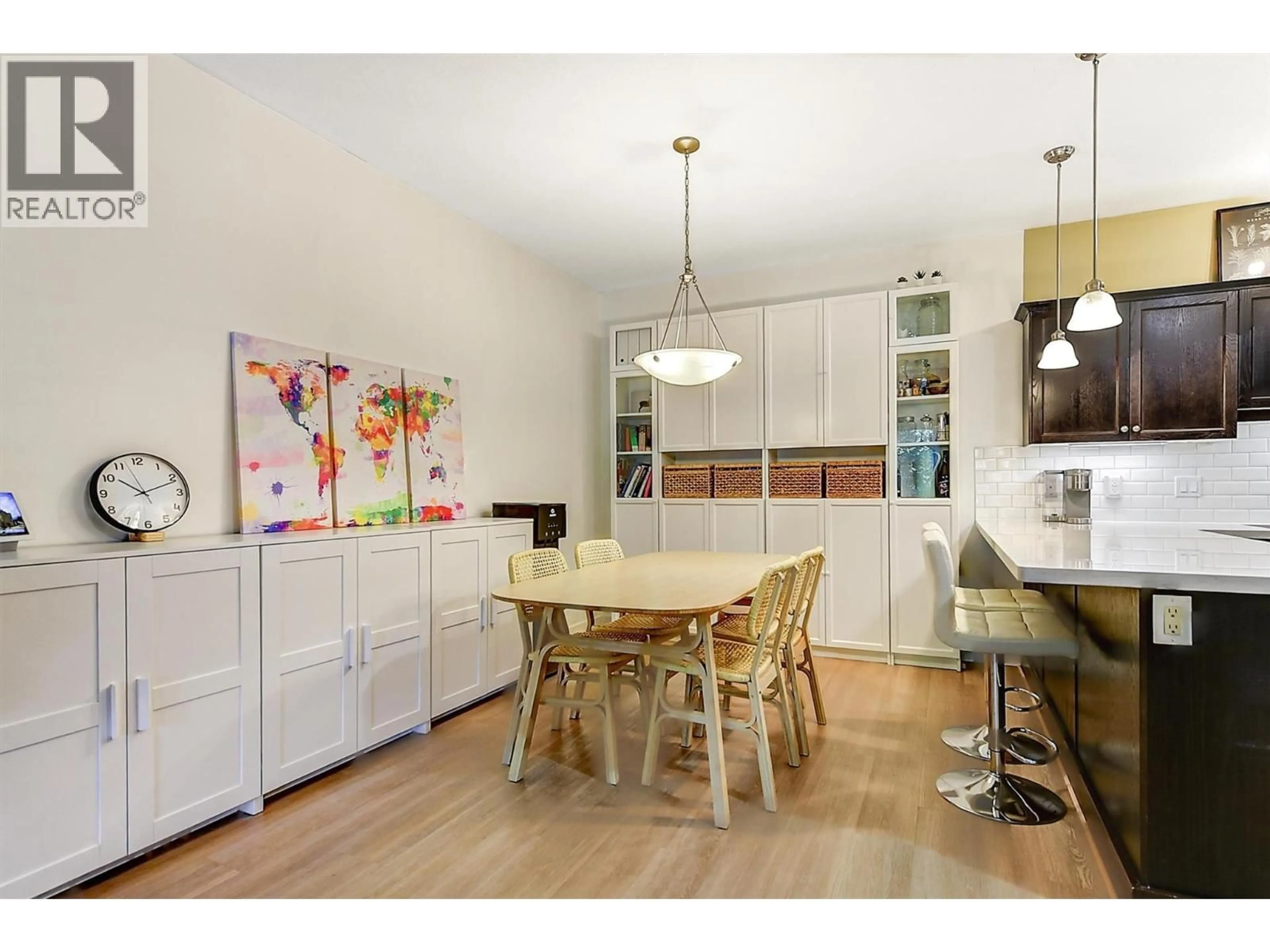 Open concept kitchen, wood/laminate floor for 211 - 250 HOLLYWOOD ROAD SOUTH, Kelowna British Columbia V1X3S9