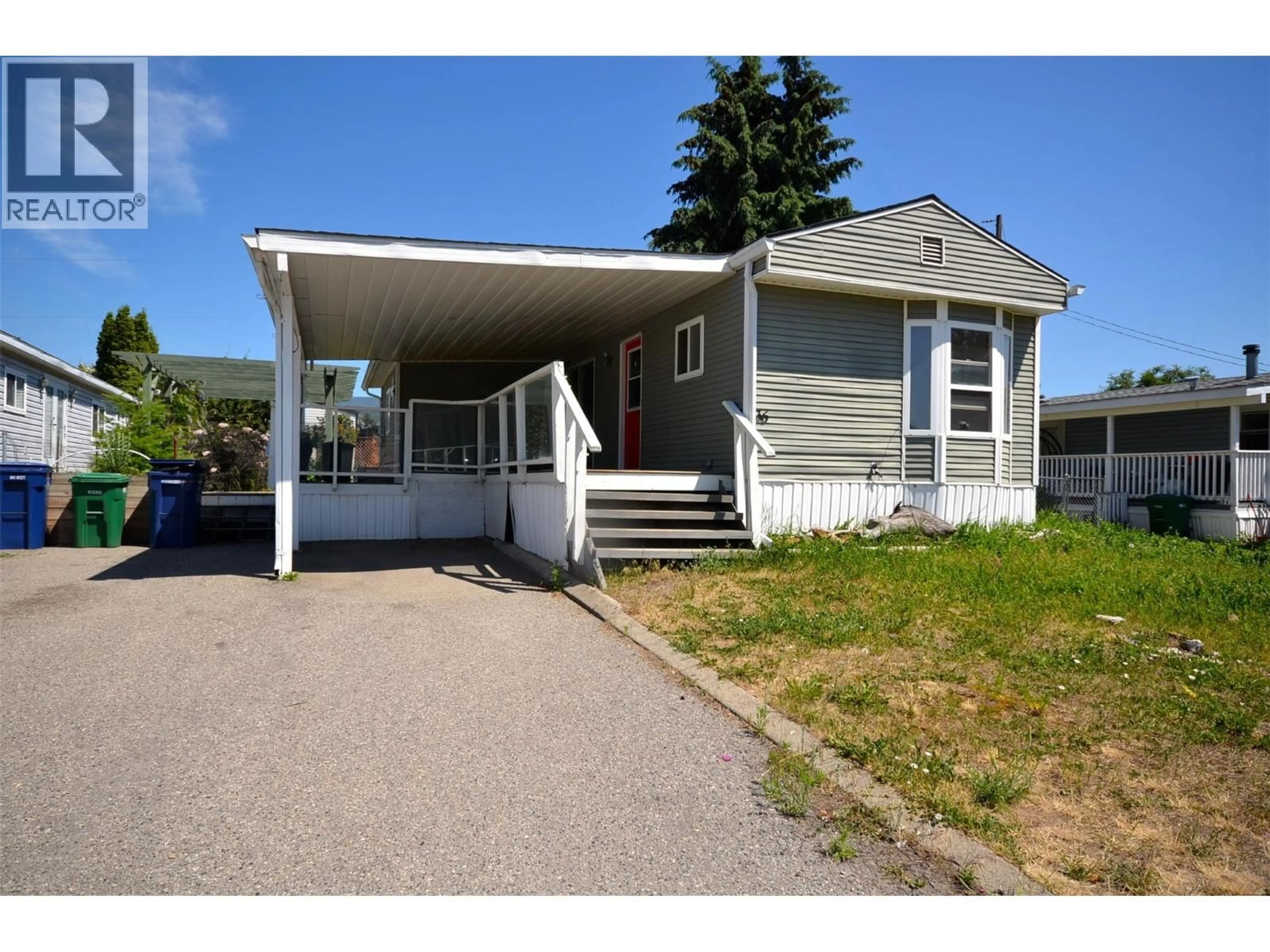 Home with vinyl exterior material, street for 36 - 9020 JIM BAILEY ROAD, Kelowna British Columbia V4V1E5