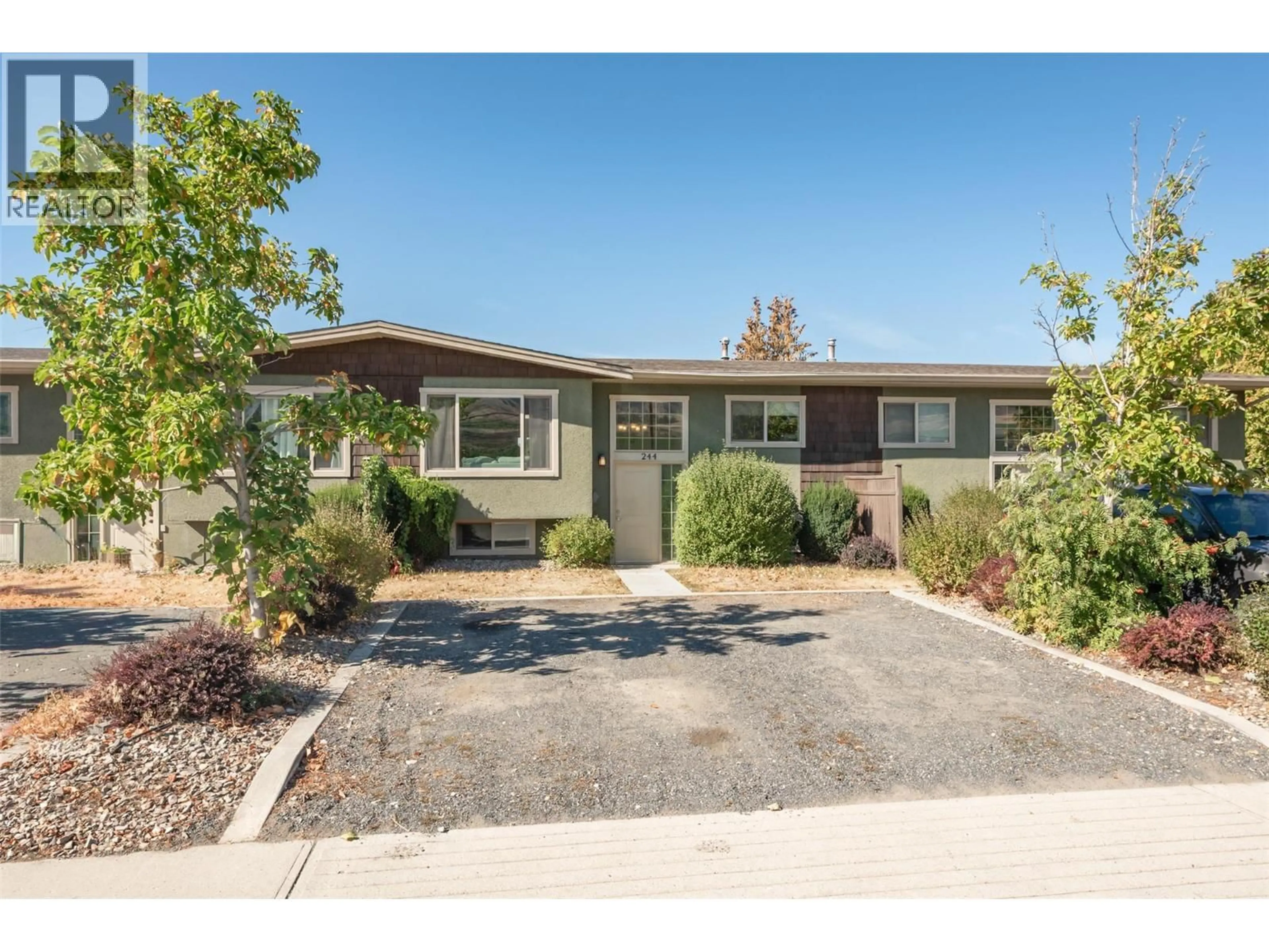 Home with vinyl exterior material, street for 244 PRIOR ROAD SOUTH, Kelowna British Columbia V1X1W2