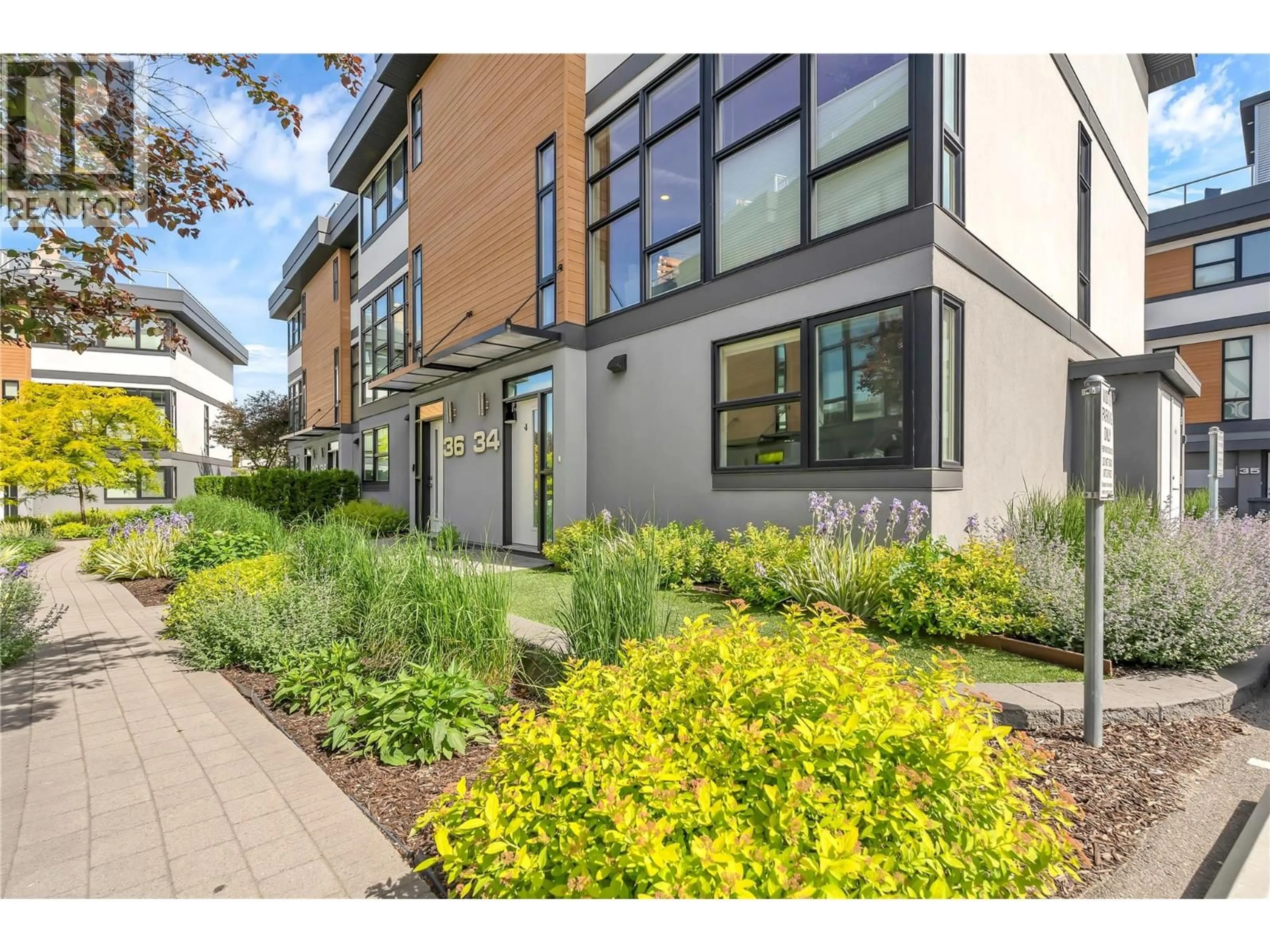 Home with brick exterior material, street for 34 - 1515 HIGHLAND DRIVE NORTH, Kelowna British Columbia V1Y0C9