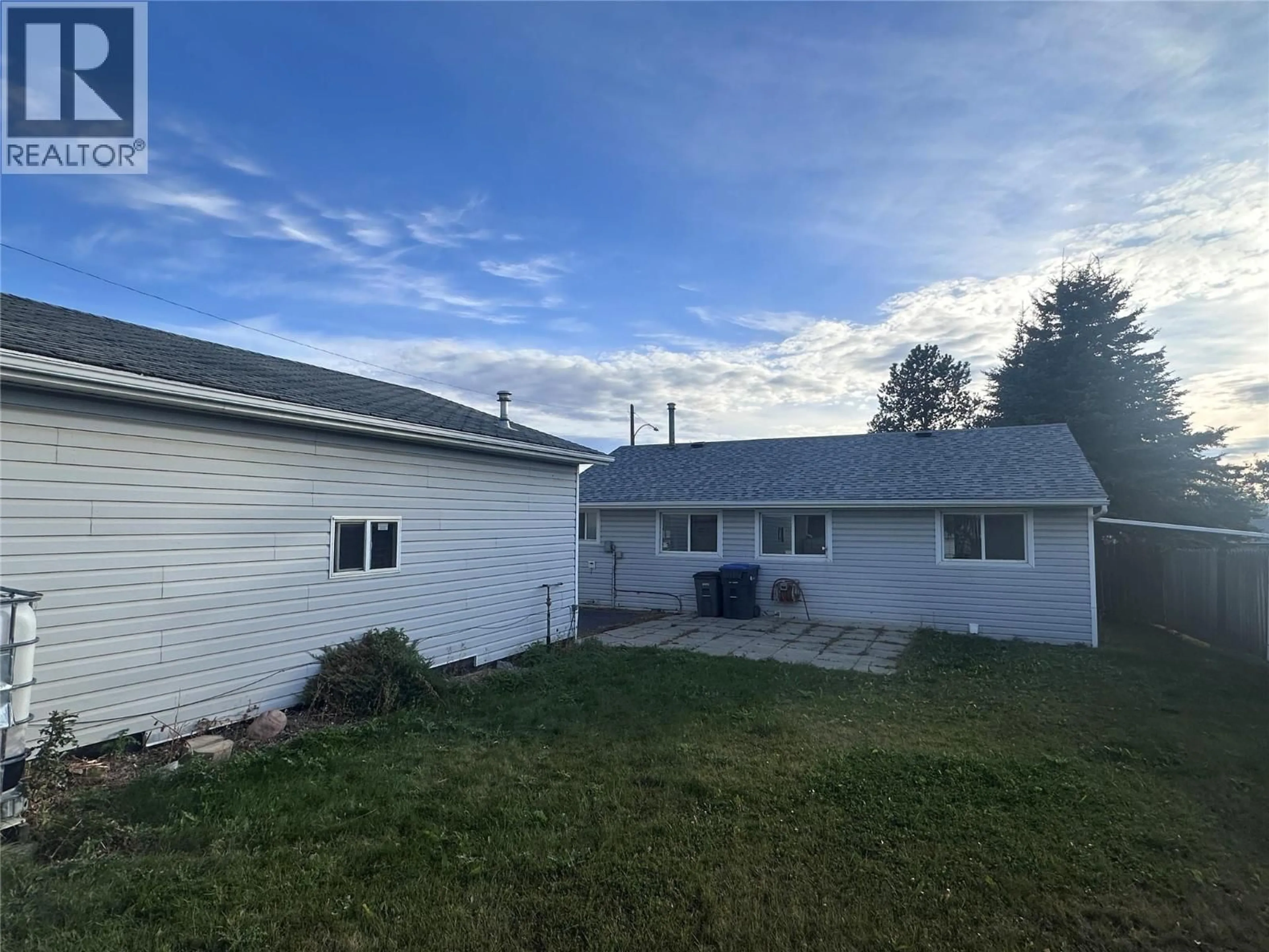 A pic from outside/outdoor area/front of a property/back of a property/a pic from drone, unknown for 1020 REASBECK CRESCENT, Dawson Creek British Columbia V1G1P2