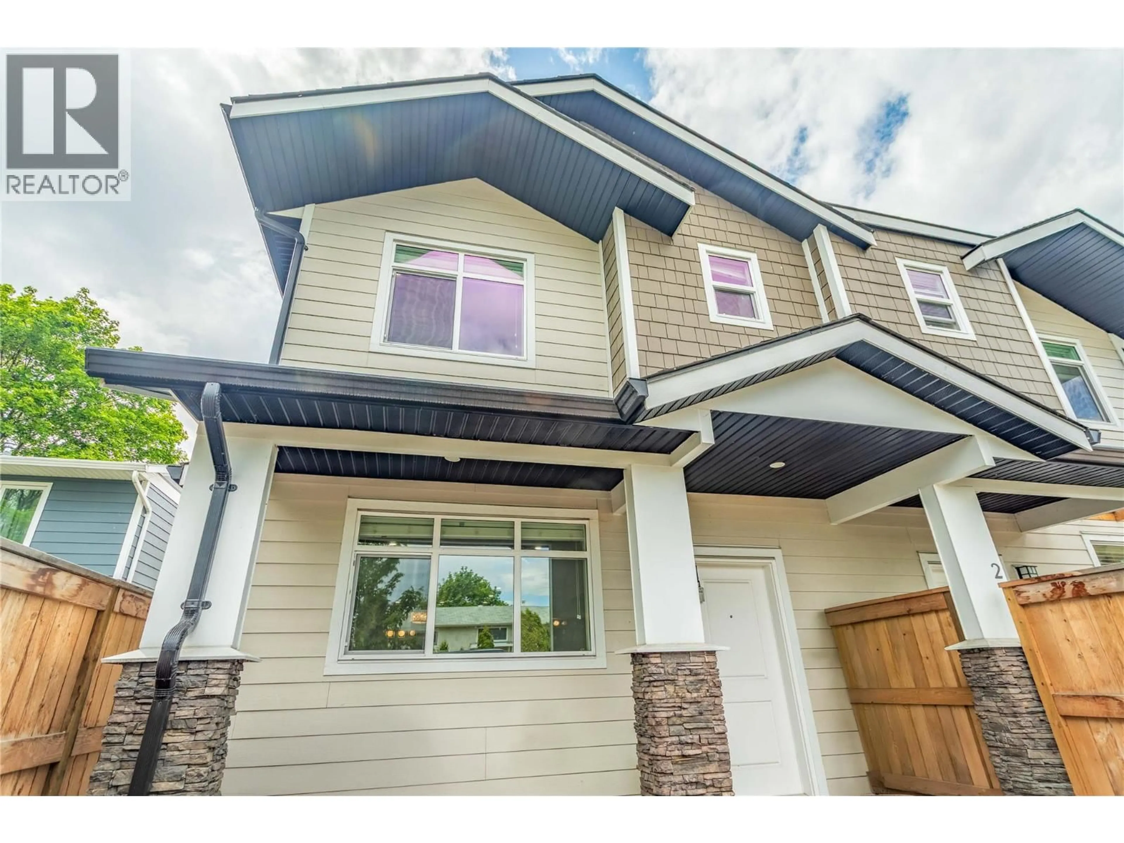 Home with vinyl exterior material, street for 1 - 782 COOPLAND CRESCENT, Kelowna British Columbia V1Y2V1