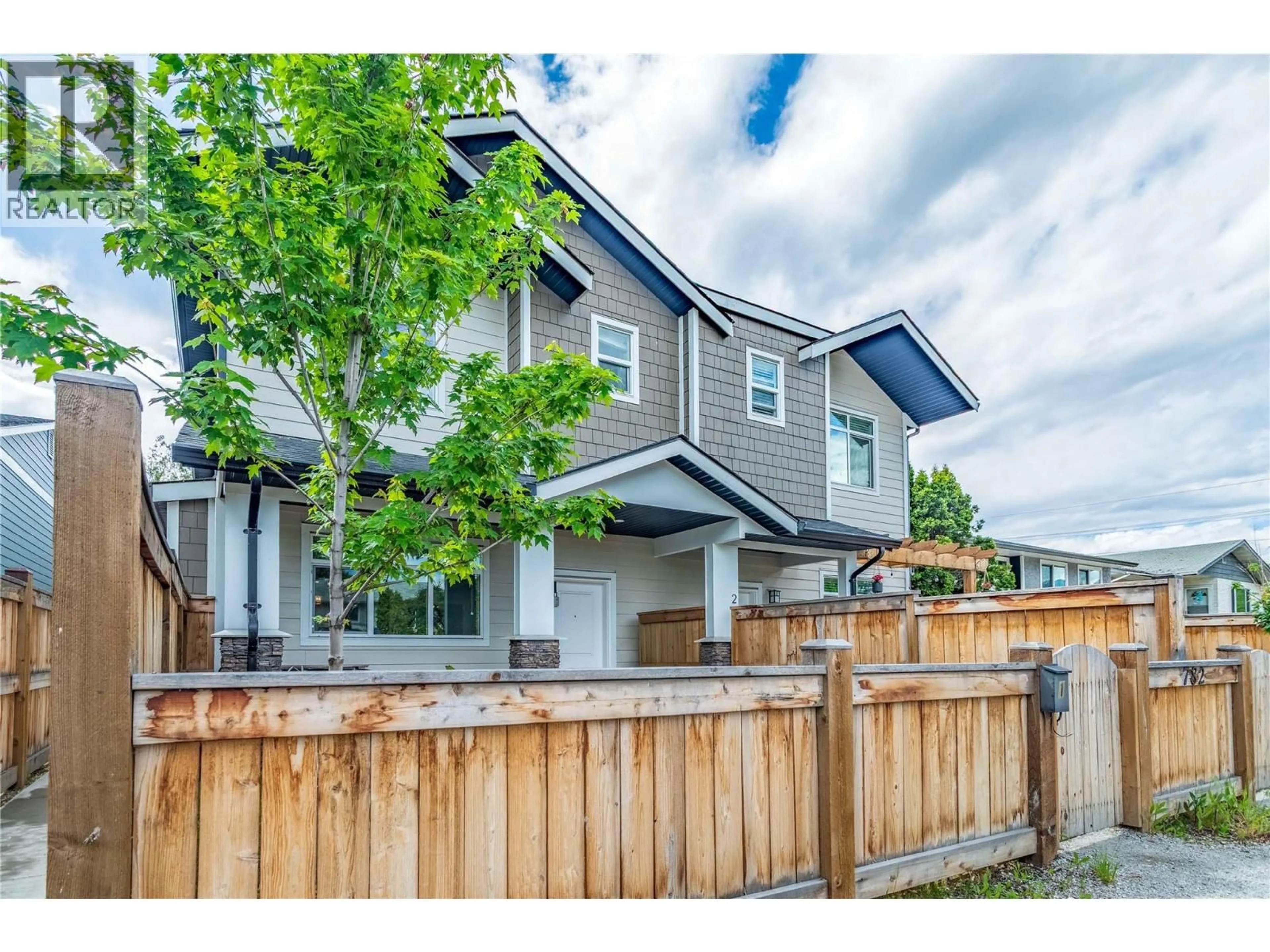 Home with vinyl exterior material, street for 1 - 782 COOPLAND CRESCENT, Kelowna British Columbia V1Y2V1