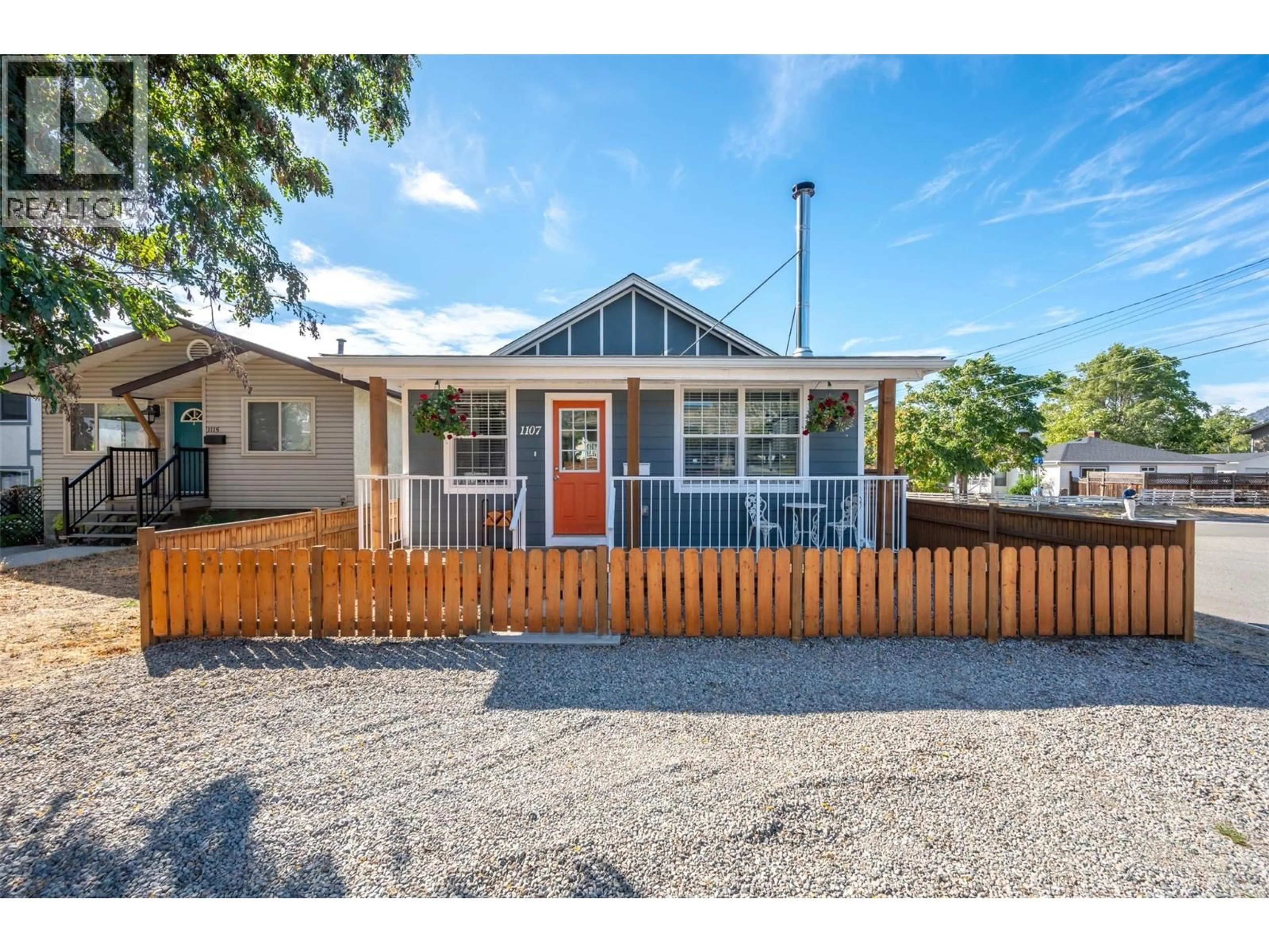Home with vinyl exterior material, street for 1107 KING STREET, Penticton British Columbia V2A4S8