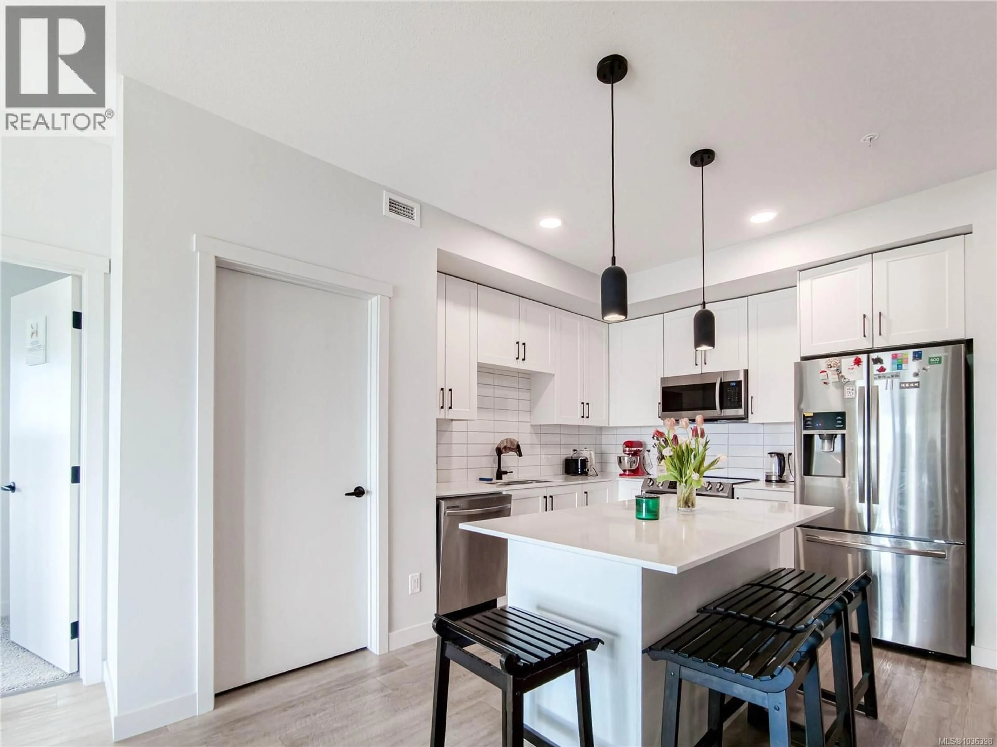 Open concept kitchen, unknown for 502 - 2465 GATEWAY ROAD, Langford British Columbia V9B6R1