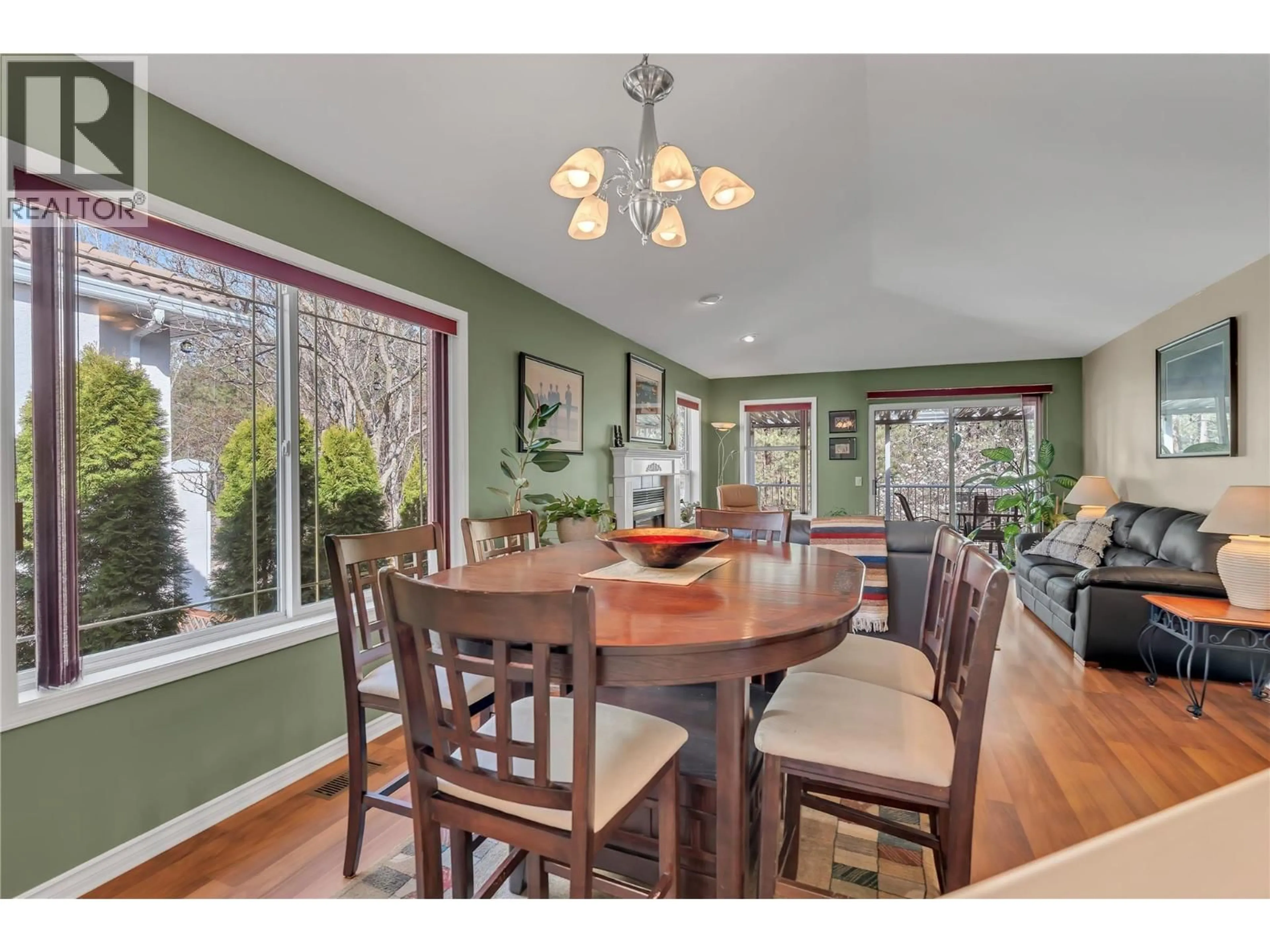 Dining room, wood/laminate floor for 3008 QUAIL CRESCENT, Kelowna British Columbia V1V1Z8