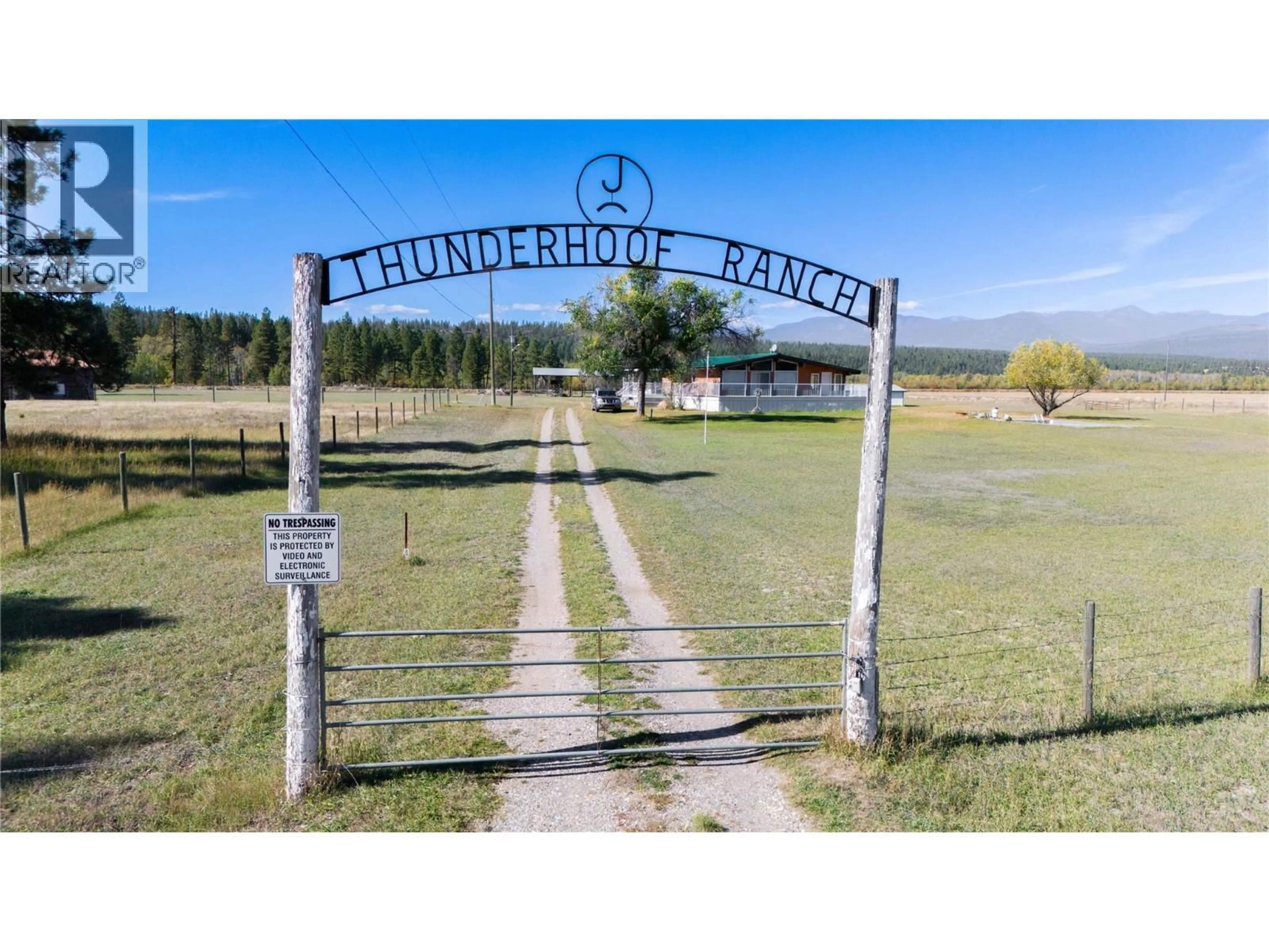 A pic from outside/outdoor area/front of a property/back of a property/a pic from drone, mountain view for 7055 93/95 HIGHWAY, Wasa British Columbia V0B2K0
