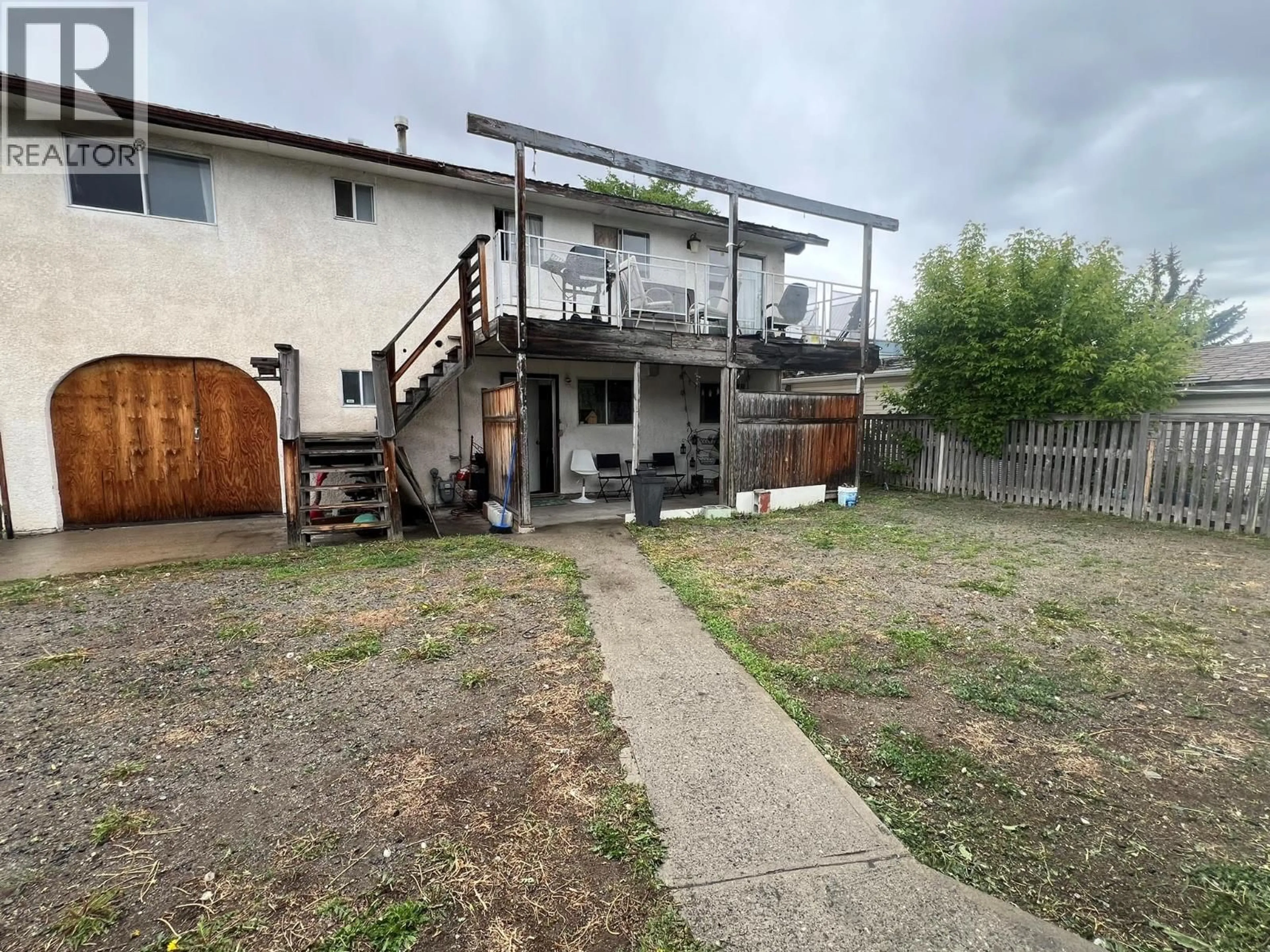 A pic from outside/outdoor area/front of a property/back of a property/a pic from drone, building for 2376 QUILCHENA AVENUE, Merritt British Columbia V1K1B8
