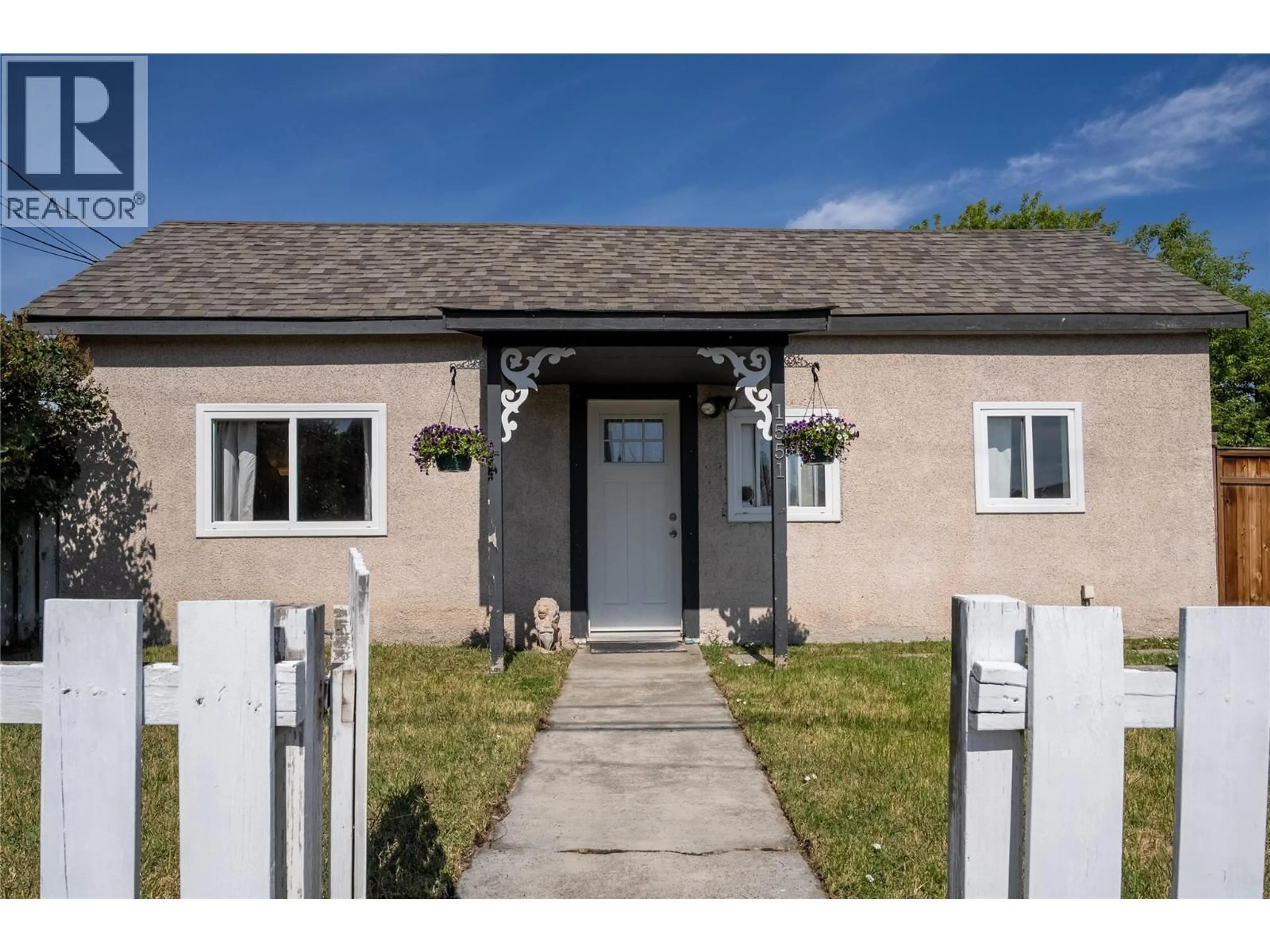 Home with vinyl exterior material, street for 1551 BLAIR STREET, Merritt British Columbia V1K1B8