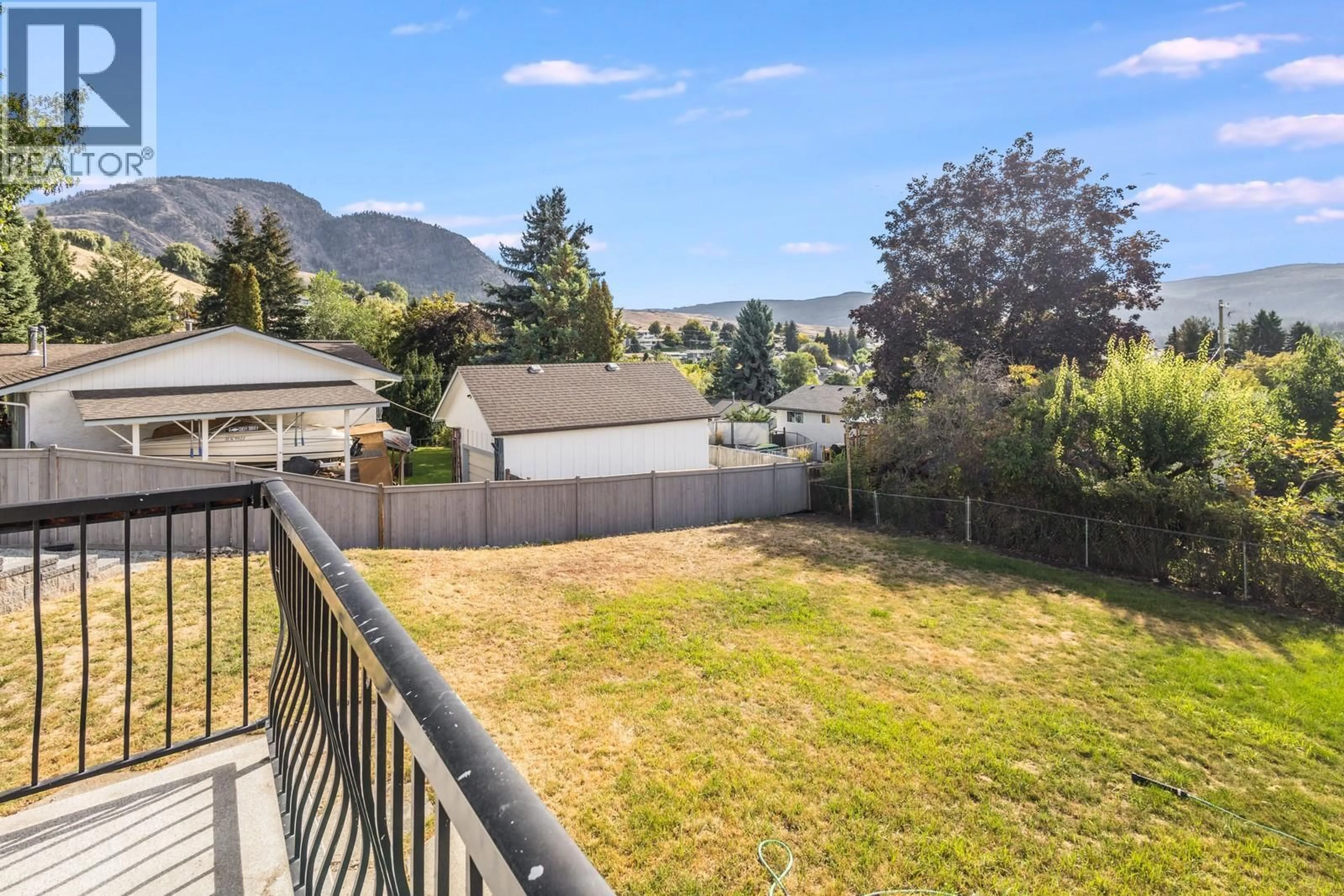 A pic from outside/outdoor area/front of a property/back of a property/a pic from drone, mountain view for 1843 GOLBECK COURT, Kelowna British Columbia V1P1L7
