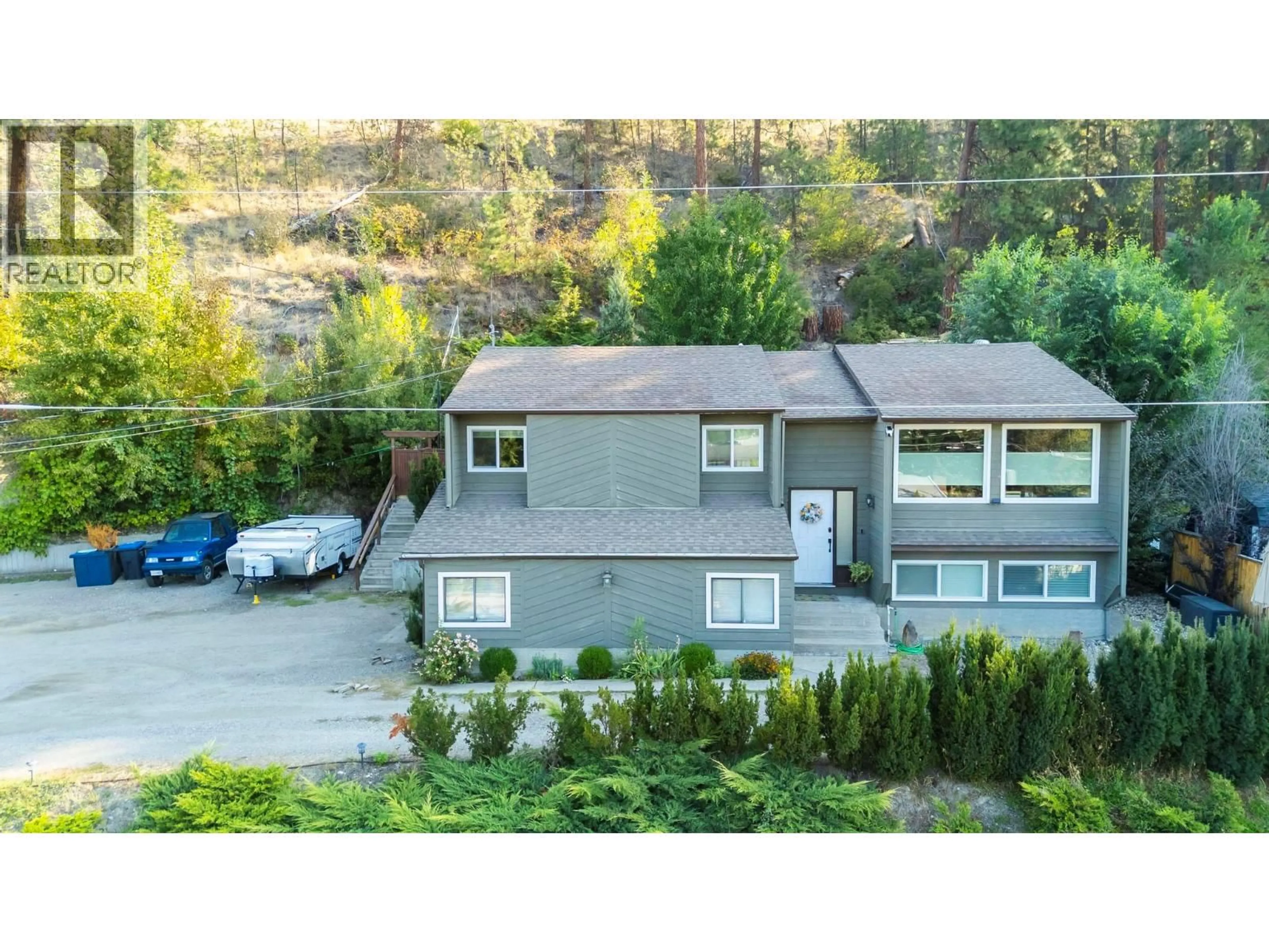 A pic from outside/outdoor area/front of a property/back of a property/a pic from drone, mountain view for 1525 HOLLYWOOD ROAD SOUTH, Kelowna British Columbia V1X4P2