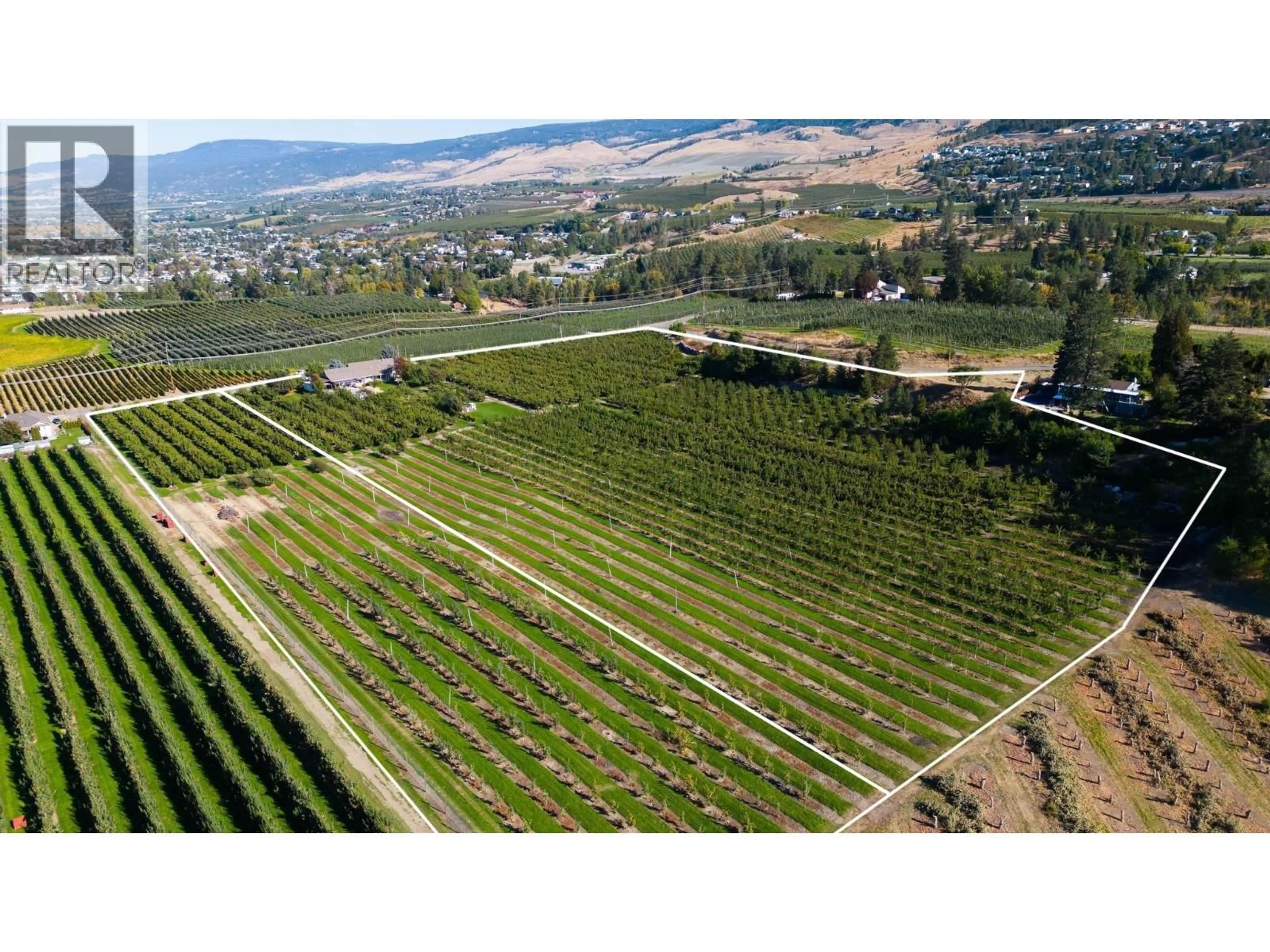 A pic from outside/outdoor area/front of a property/back of a property/a pic from drone, mountain view for TEASDALE ROAD, Kelowna British Columbia V1P1C8
