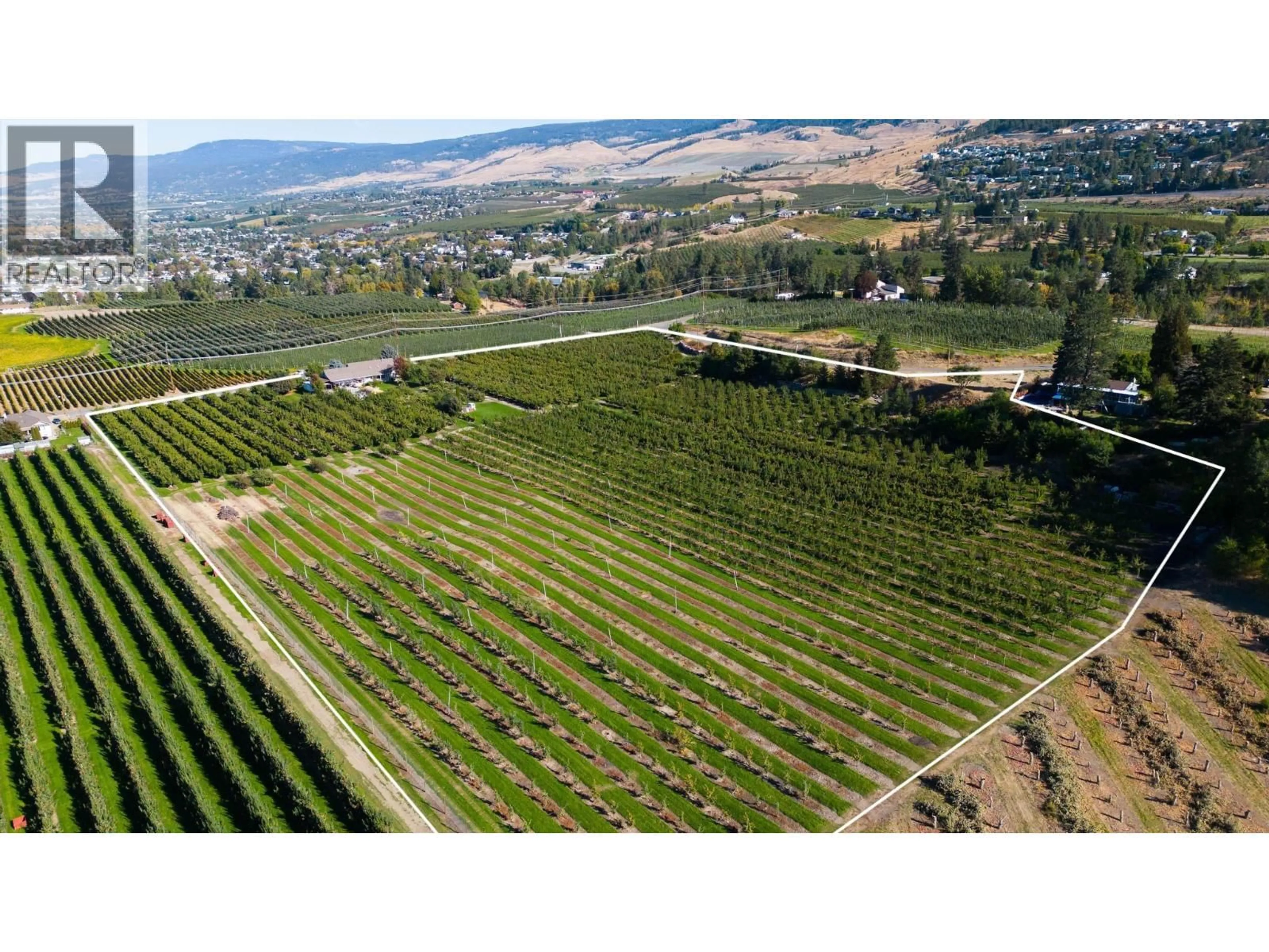 A pic from outside/outdoor area/front of a property/back of a property/a pic from drone, mountain view for TEASDALE ROAD, Kelowna British Columbia V1P1C8