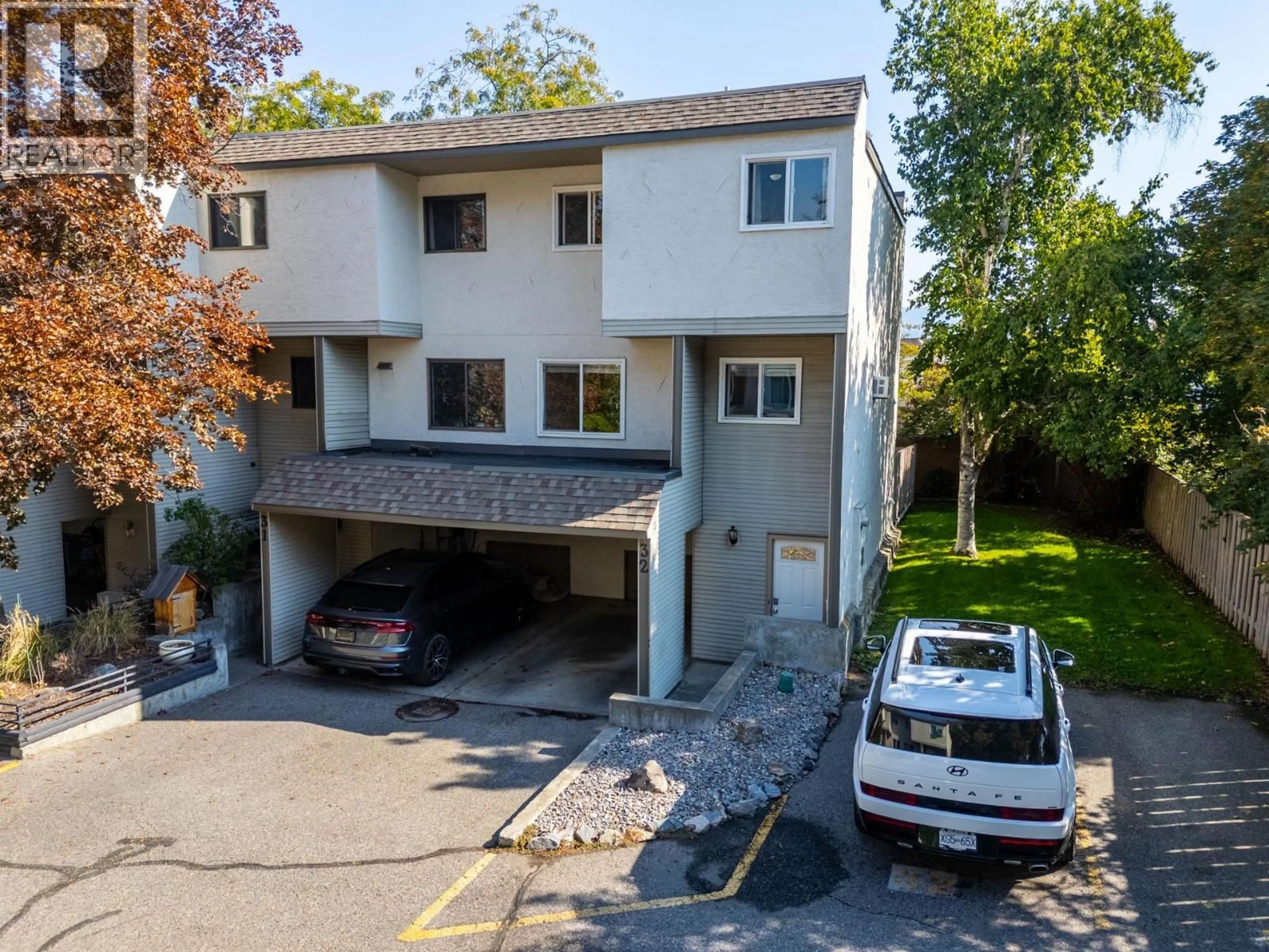 A pic from outside/outdoor area/front of a property/back of a property/a pic from drone, street for 32 - 1985 BURTCH ROAD, Kelowna British Columbia V1Y4B4