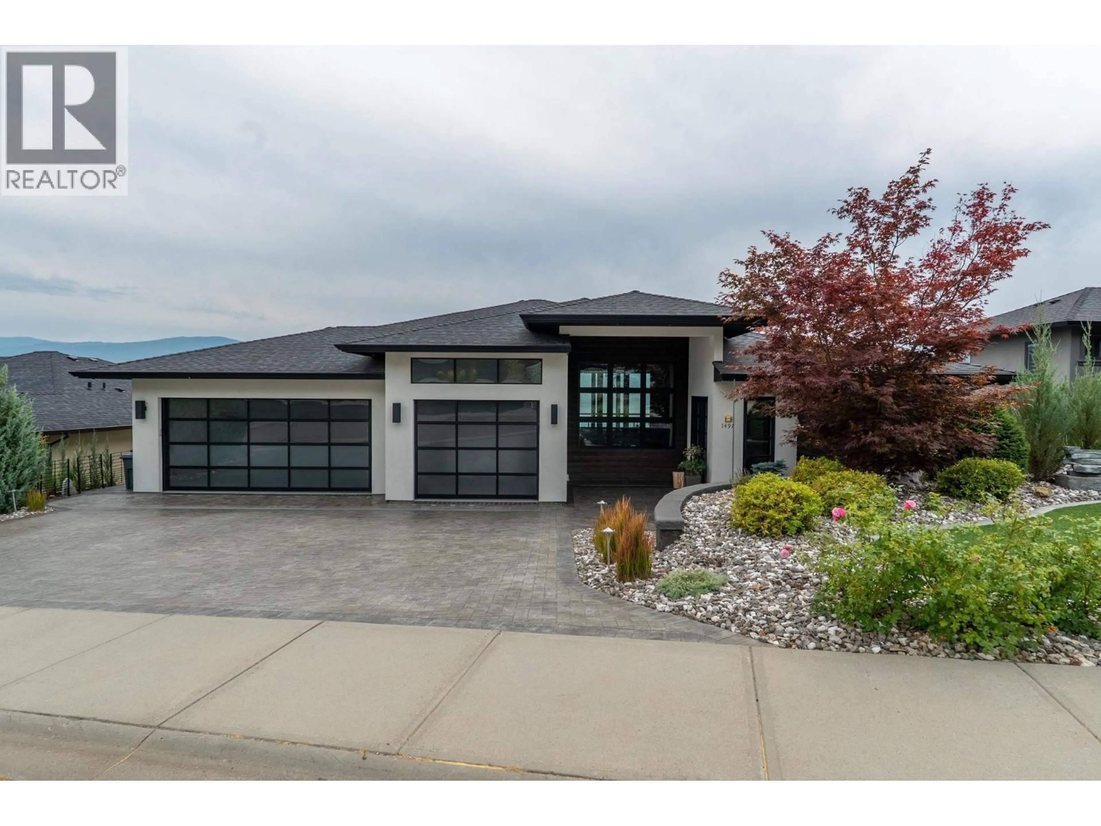 Home with brick exterior material, street for 1497 PINOT NOIR DRIVE, West Kelowna British Columbia V4T3H9
