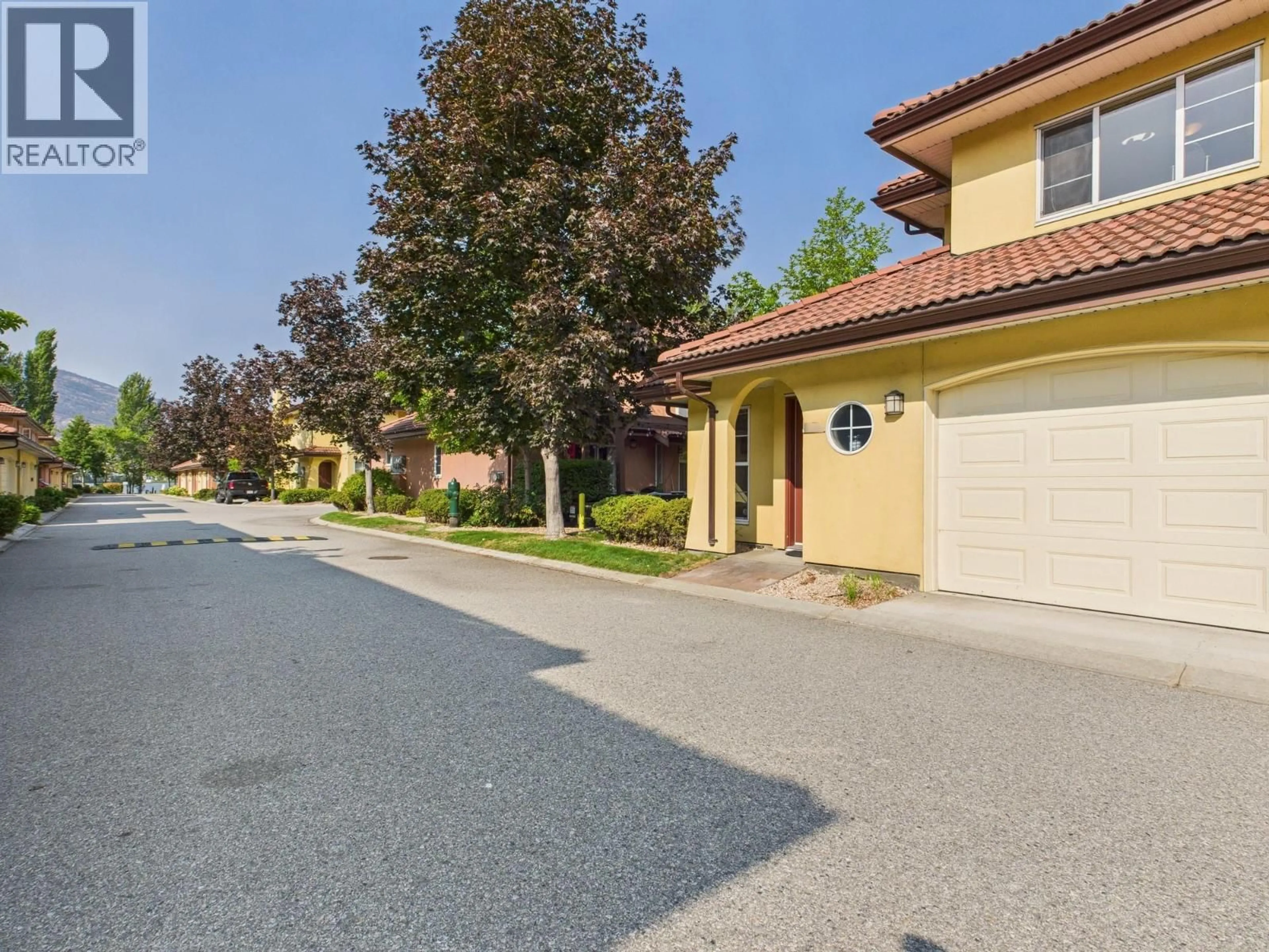 A pic from outside/outdoor area/front of a property/back of a property/a pic from drone, street for 40 - 7600 COTTONWOOD DRIVE, Osoyoos British Columbia V0H1V3