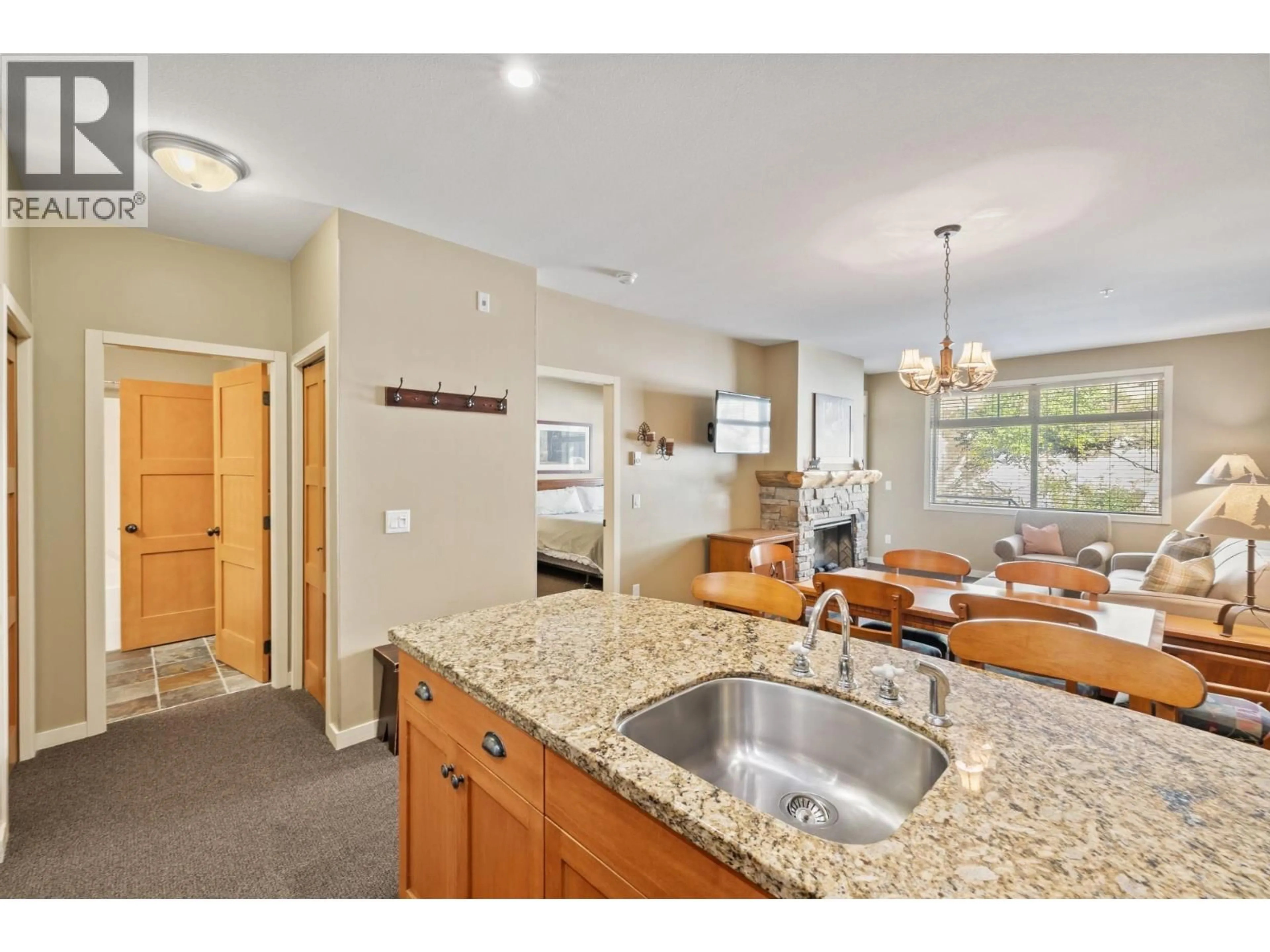 Open concept kitchen, ceramic/tile floor for 202 - 255 FEATHERTOP WAY, Big White British Columbia V1P1P3