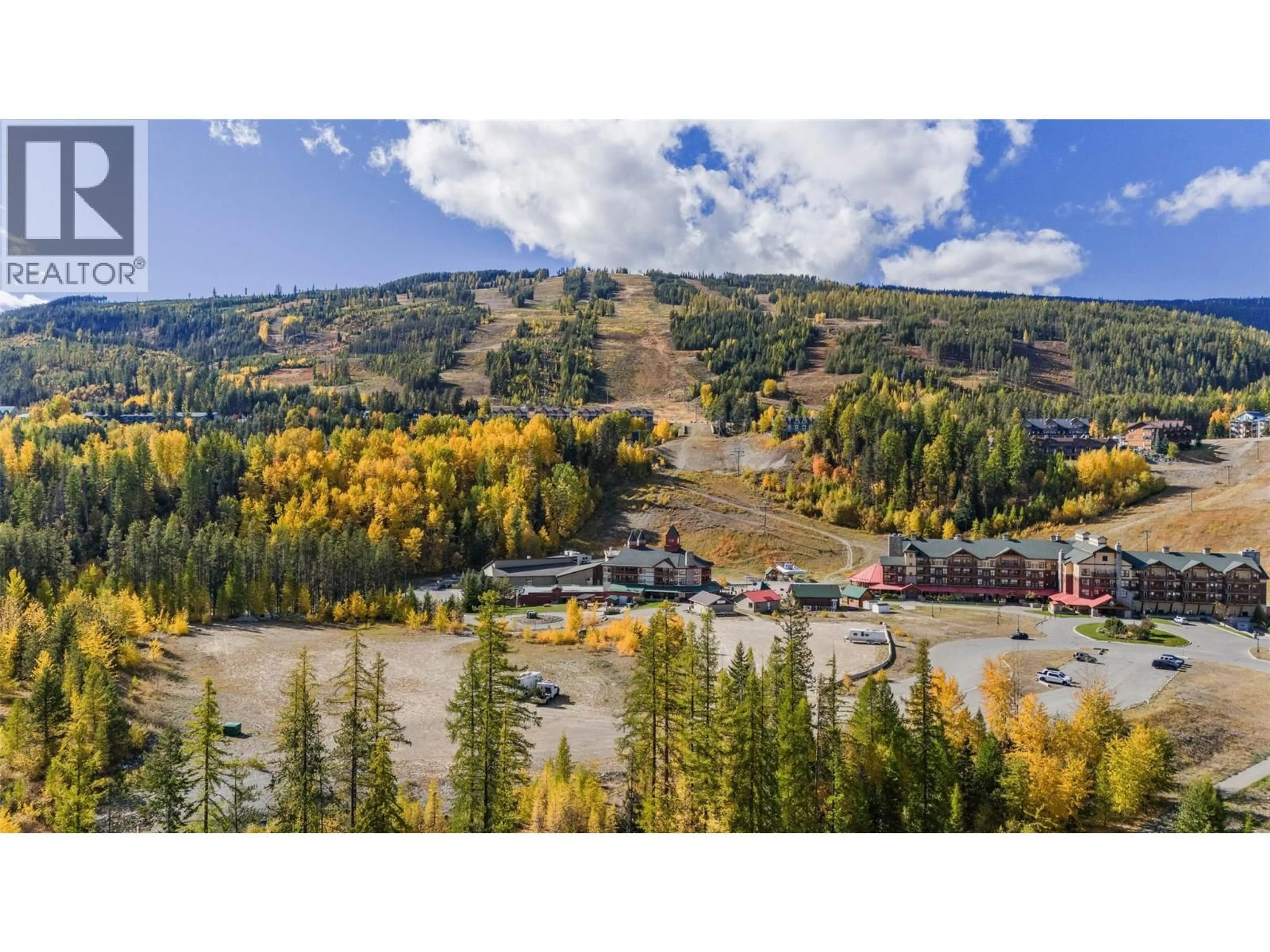 A pic from outside/outdoor area/front of a property/back of a property/a pic from drone, water/lake/river/ocean view for 221 STEMWINDER DRIVE, Kimberley British Columbia V1A3E9