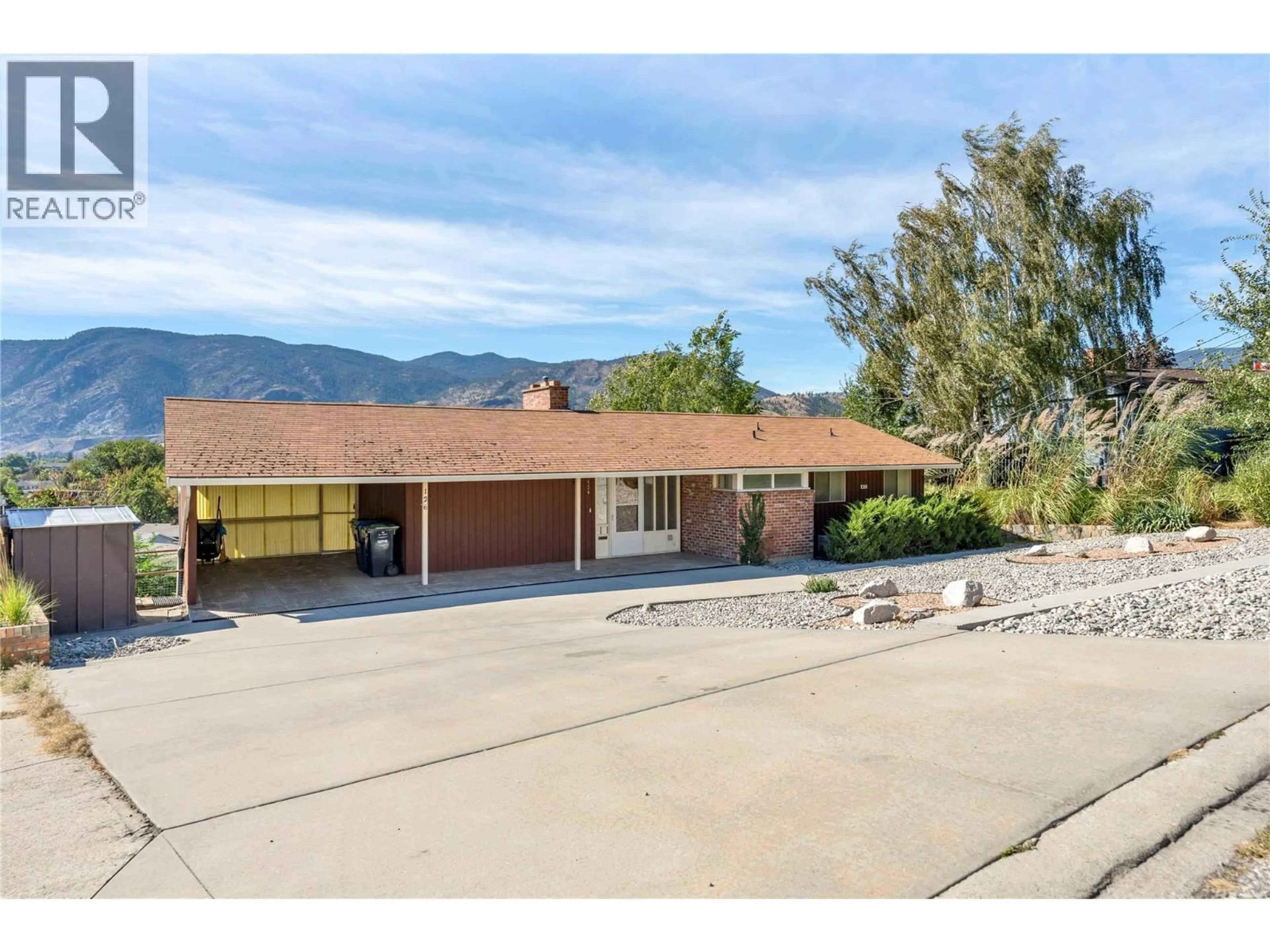 A pic from outside/outdoor area/front of a property/back of a property/a pic from drone, mountain view for 126 CRAIG DRIVE, Penticton British Columbia V2A3R9