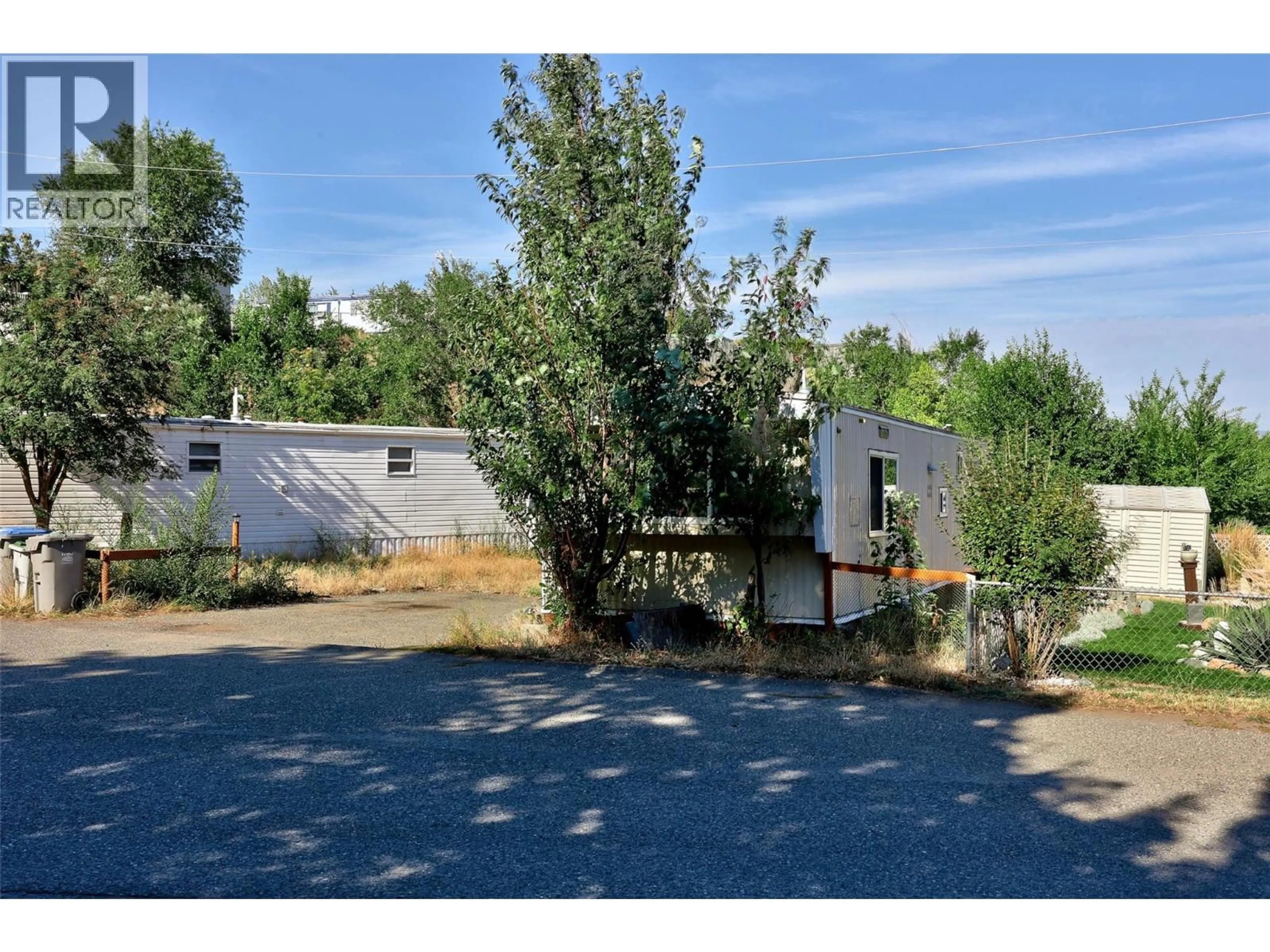 A pic from outside/outdoor area/front of a property/back of a property/a pic from drone, unknown for 102 - 1175 ROSE HILL ROAD, Kamloops British Columbia V2E1G9
