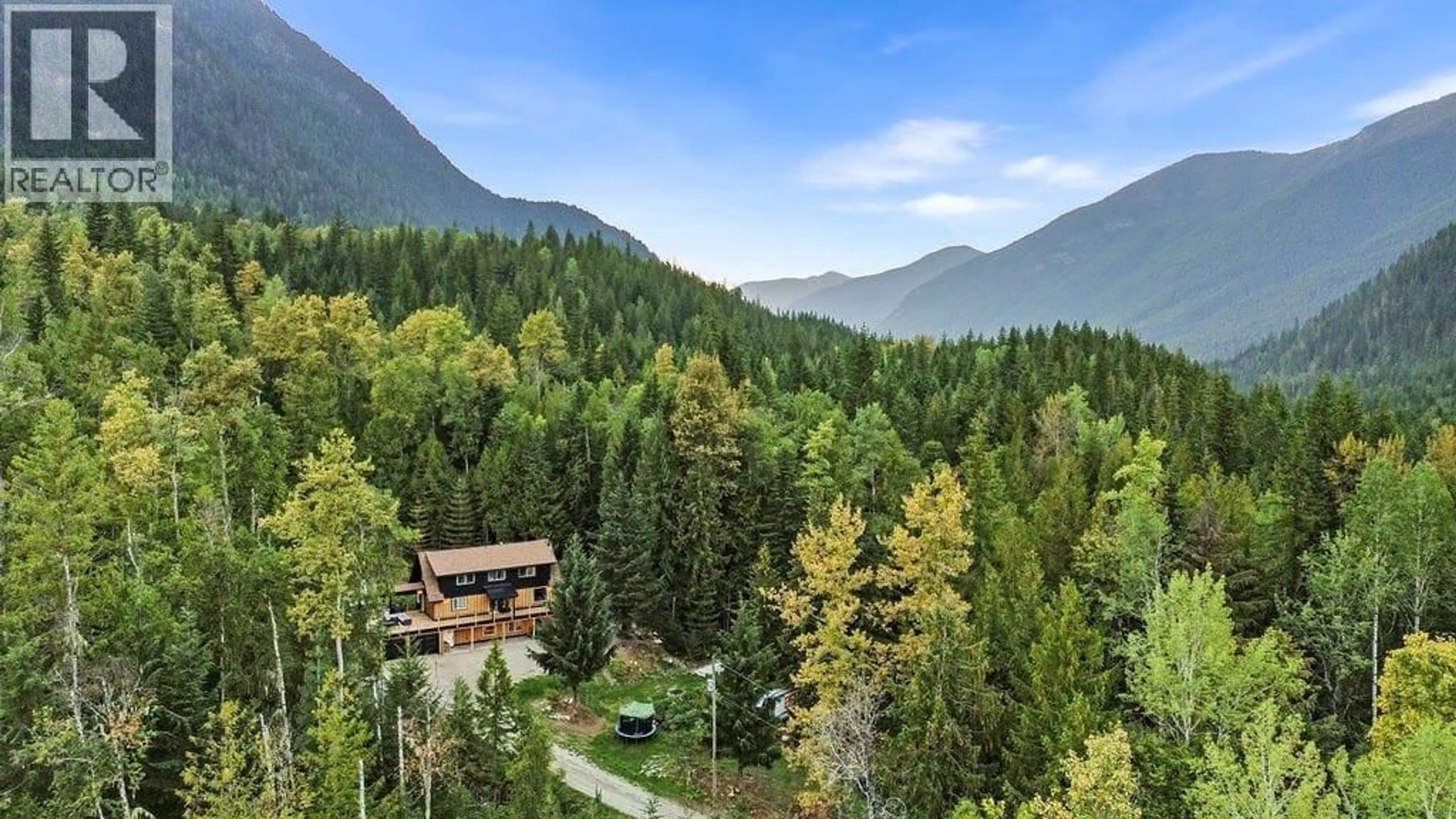 A pic from outside/outdoor area/front of a property/back of a property/a pic from drone, forest/trees view for 2227 ALLSHOUSE ROAD, Summit Lake British Columbia V0G1R1