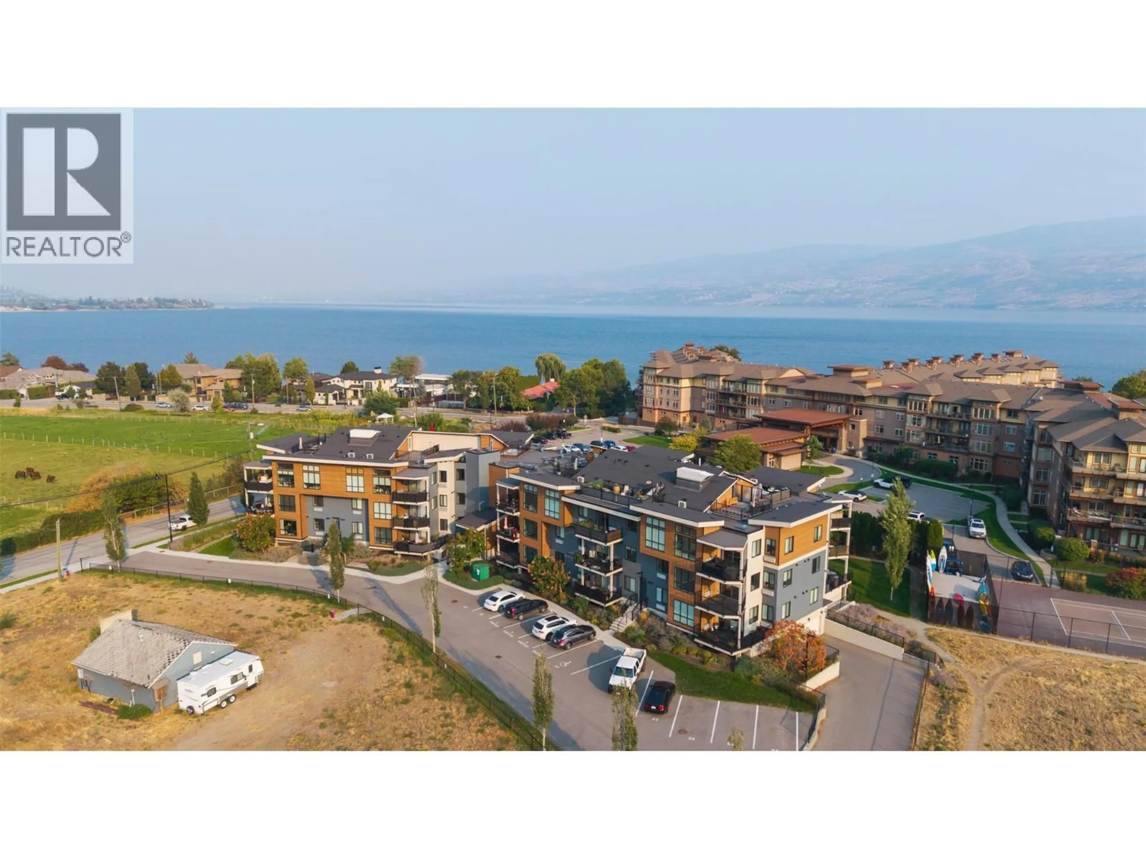 A pic from outside/outdoor area/front of a property/back of a property/a pic from drone, unknown for 1208 - 4215 GELLATLY ROAD SOUTH, West Kelowna British Columbia V4T3N1
