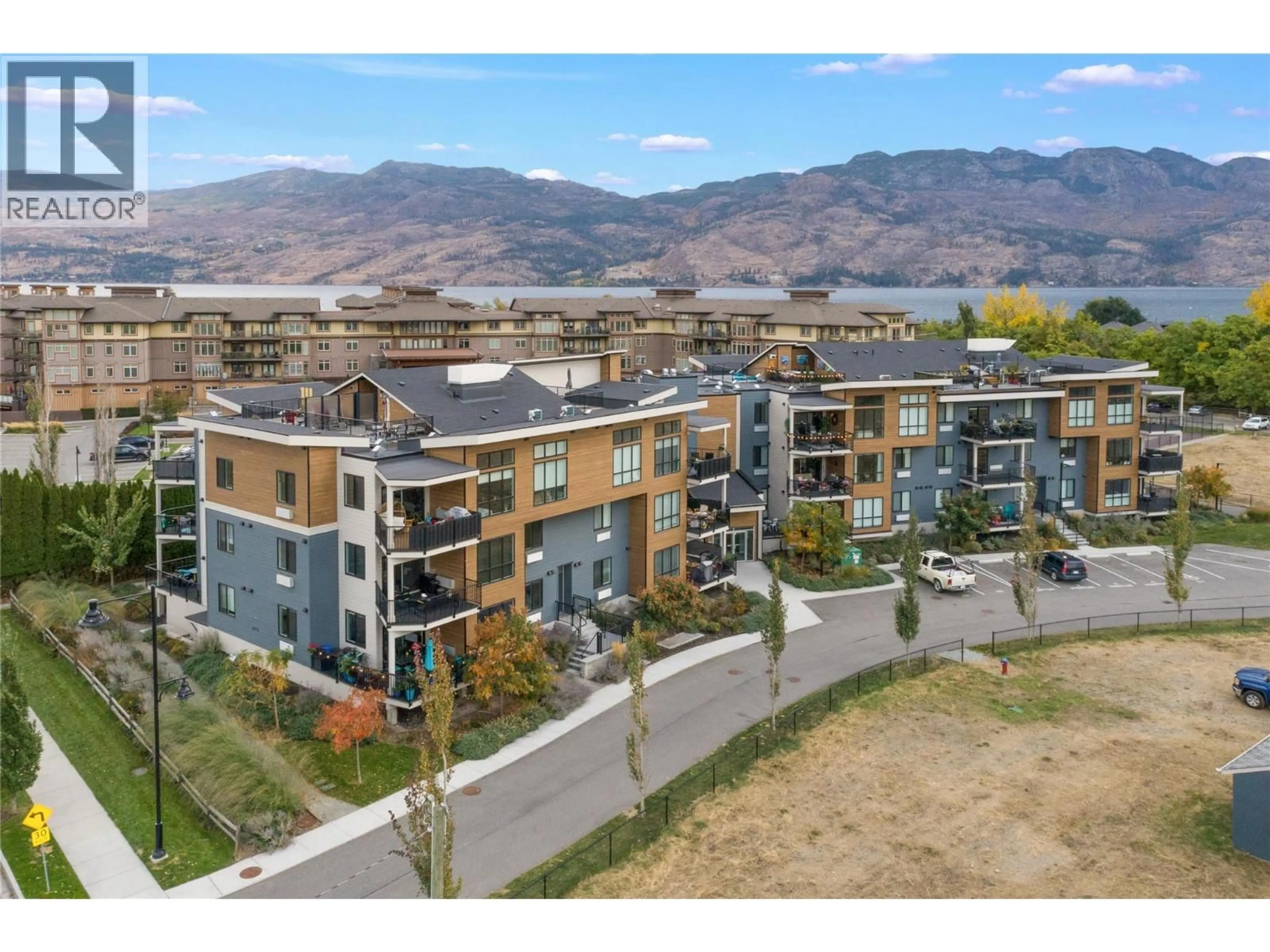 A pic from outside/outdoor area/front of a property/back of a property/a pic from drone, mountain view for 1208 - 4215 GELLATLY ROAD SOUTH, West Kelowna British Columbia V4T3N1