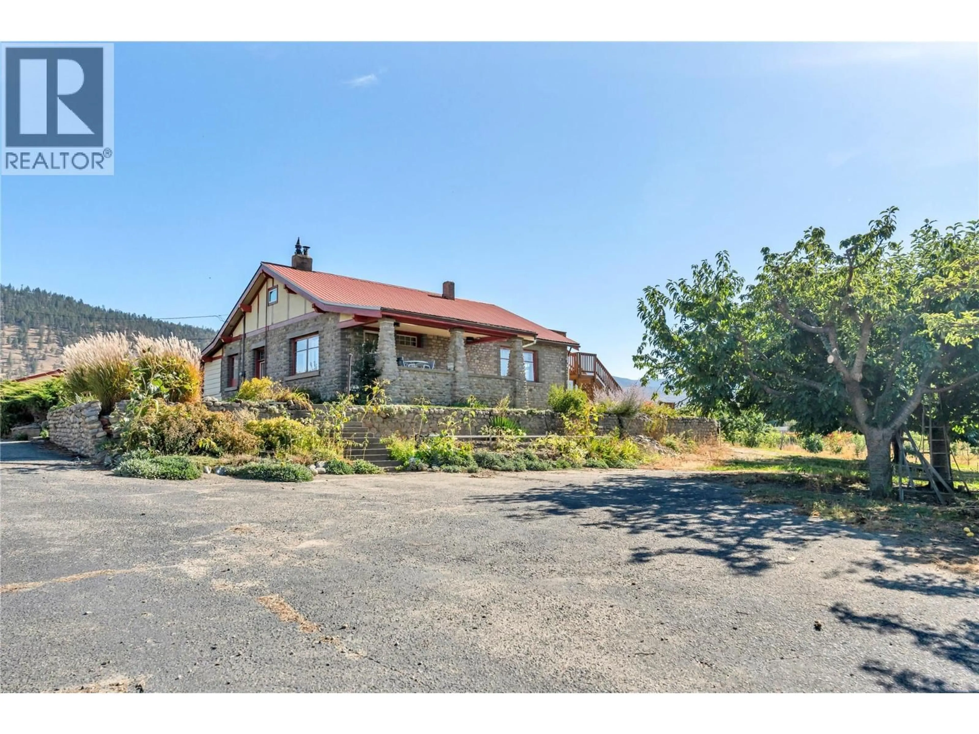 A pic from outside/outdoor area/front of a property/back of a property/a pic from drone, street for 235 MIDDLE BENCH ROAD NORTH, Penticton British Columbia V2A8S5